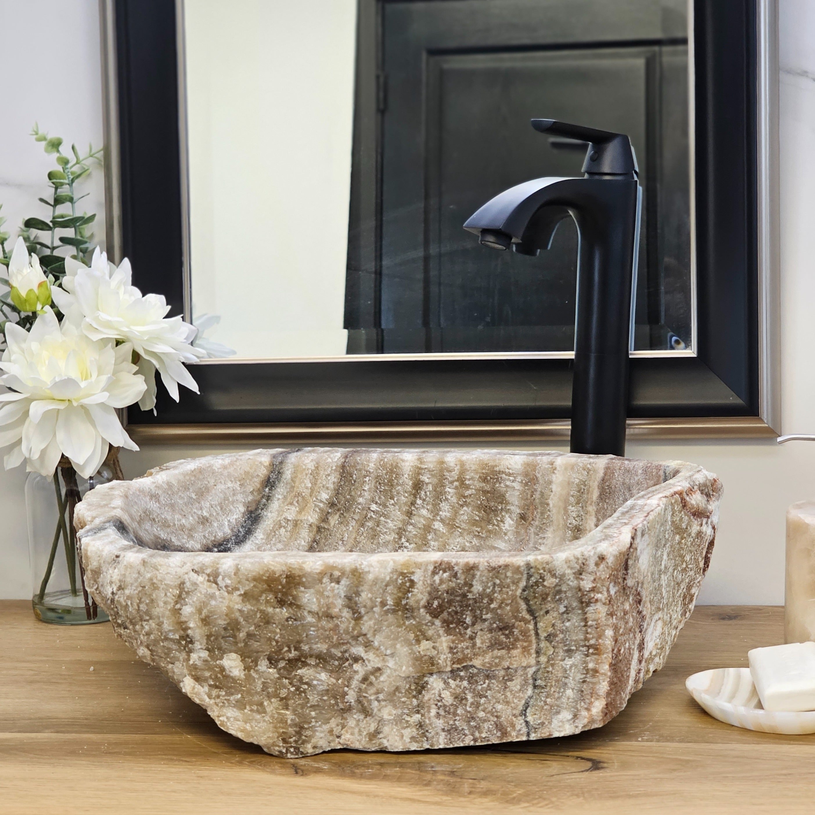 Brown and Tan Onyx Vessel Sink. A beautiful work of art. We offer fast shipping. Handmade in Mexico. We hand finish, package, and ship from the USA. Buy now at www.felipeandgrace.com.