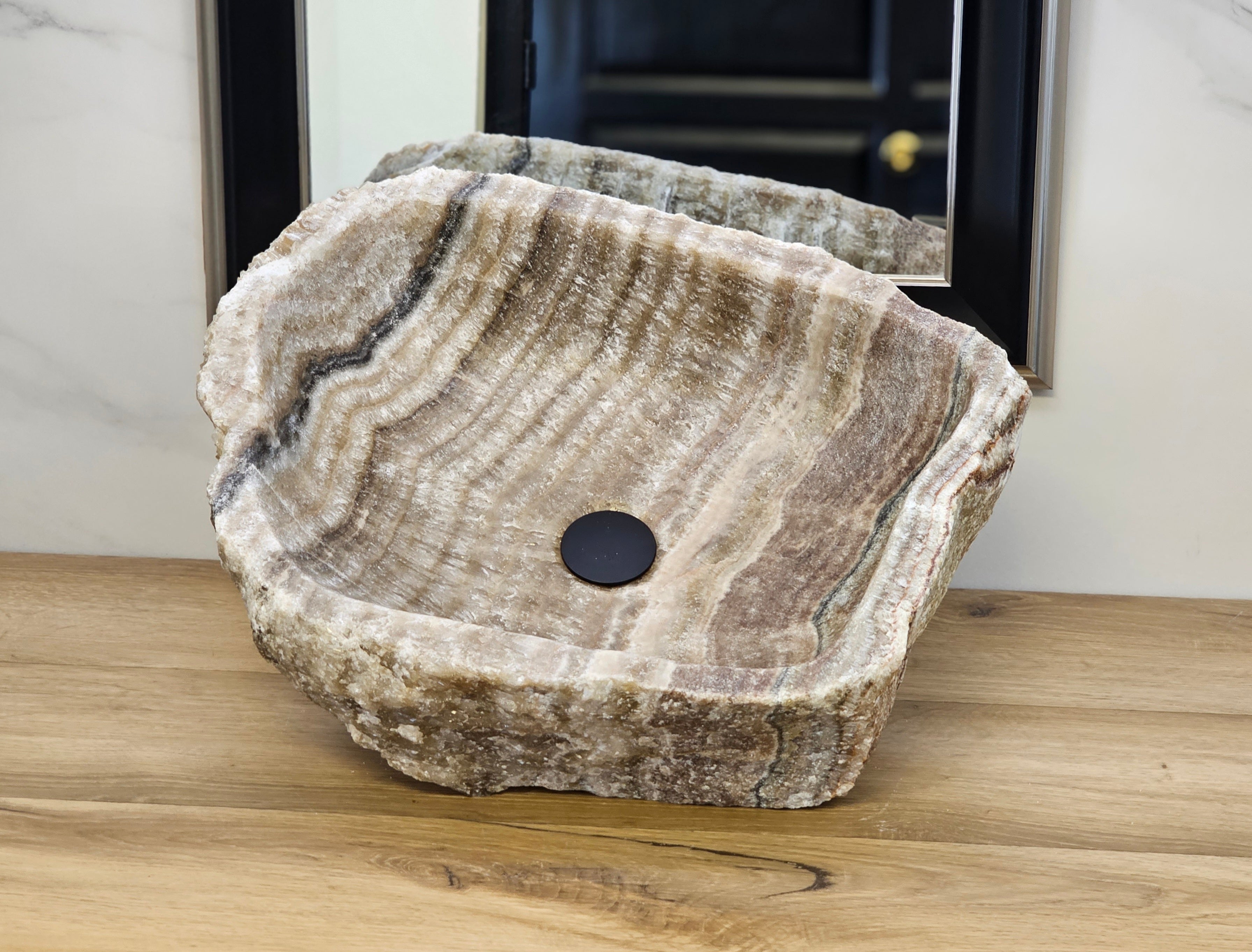 Brown and Tan Onyx Vessel Sink. A beautiful work of art. We offer fast shipping. Handmade in Mexico. We hand finish, package, and ship from the USA. Buy now at www.felipeandgrace.com.