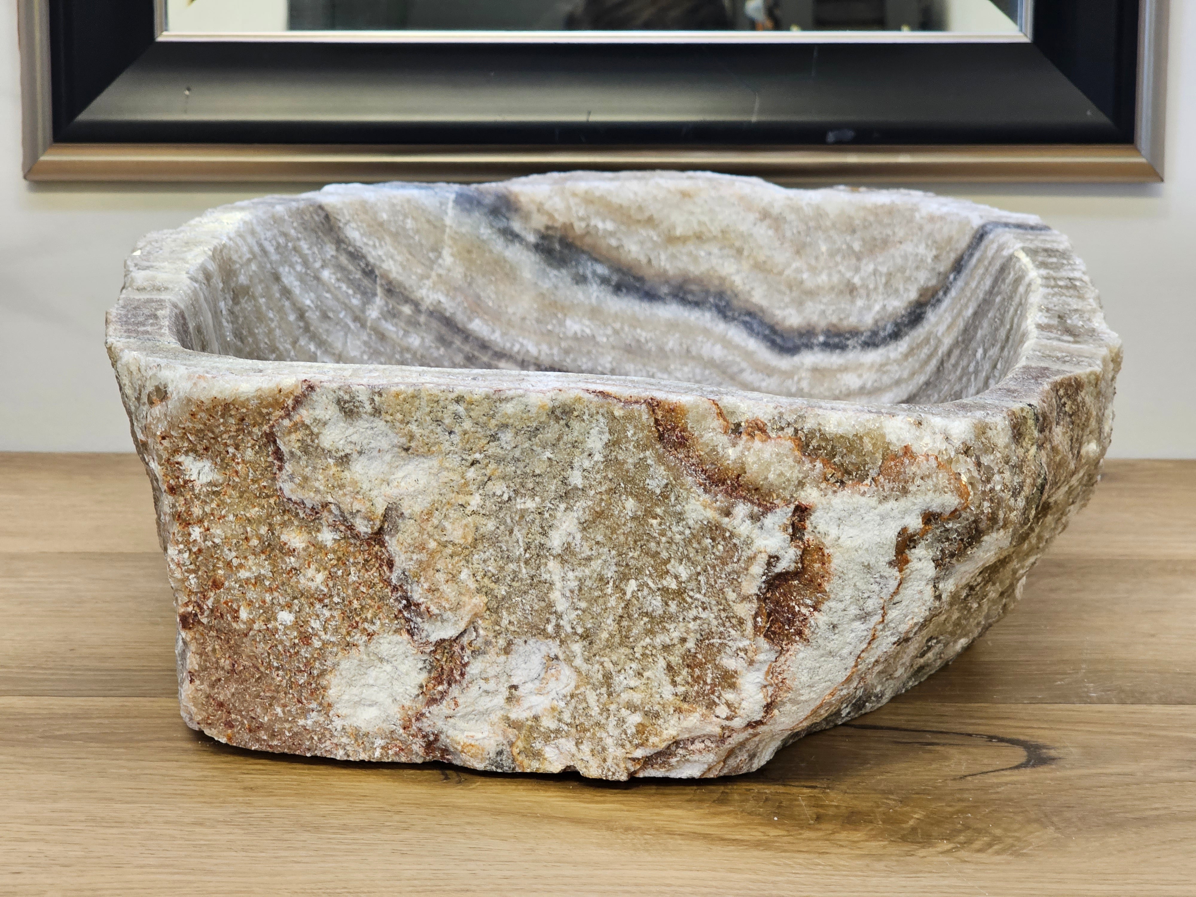 Brown and Tan Onyx Vessel Sink. A beautiful work of art. We offer fast shipping. Handmade in Mexico. We hand finish, package, and ship from the USA. Buy now at www.felipeandgrace.com.