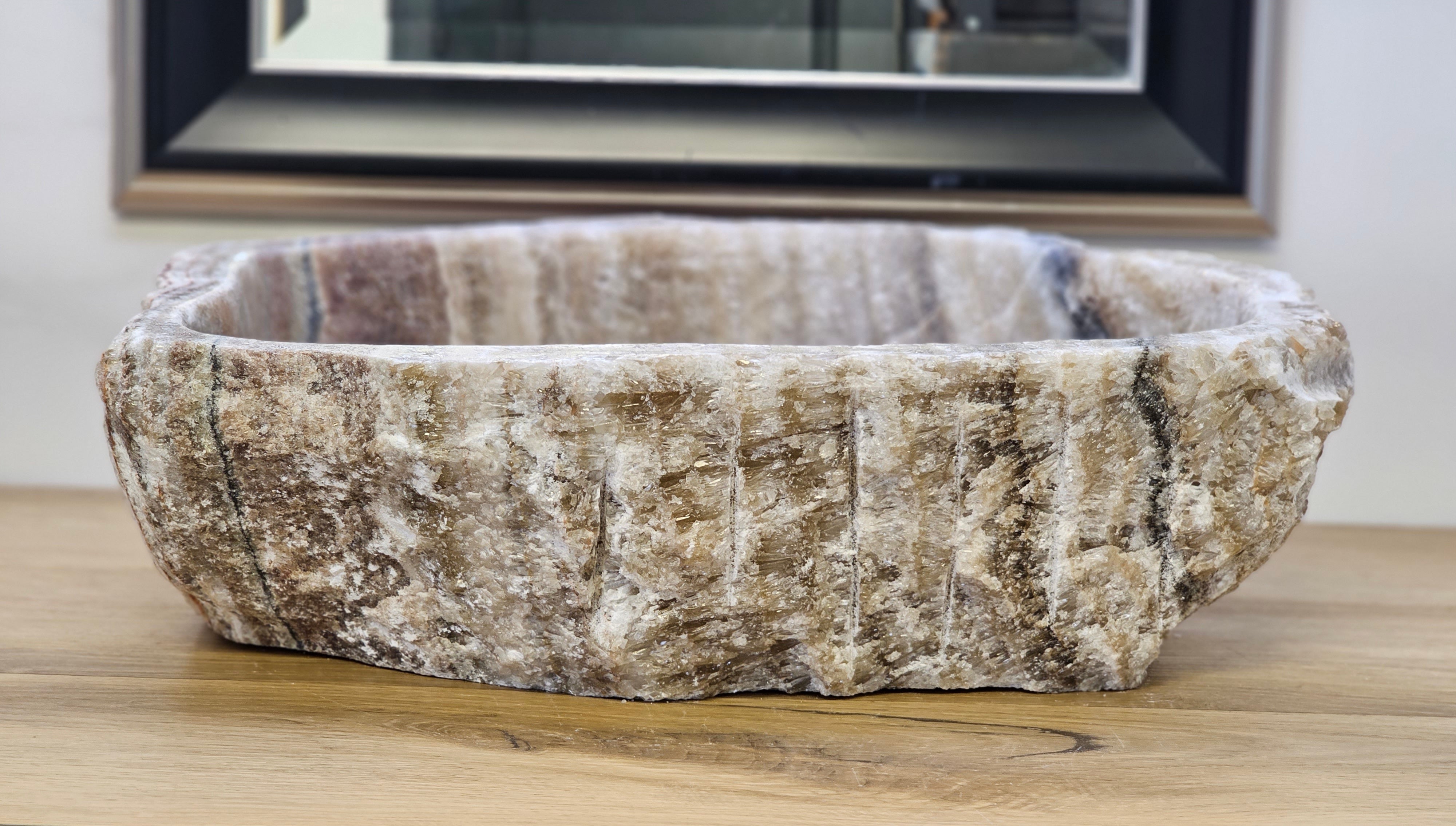 Brown and Tan Onyx Vessel Sink. A beautiful work of art. We offer fast shipping. Handmade in Mexico. We hand finish, package, and ship from the USA. Buy now at www.felipeandgrace.com.