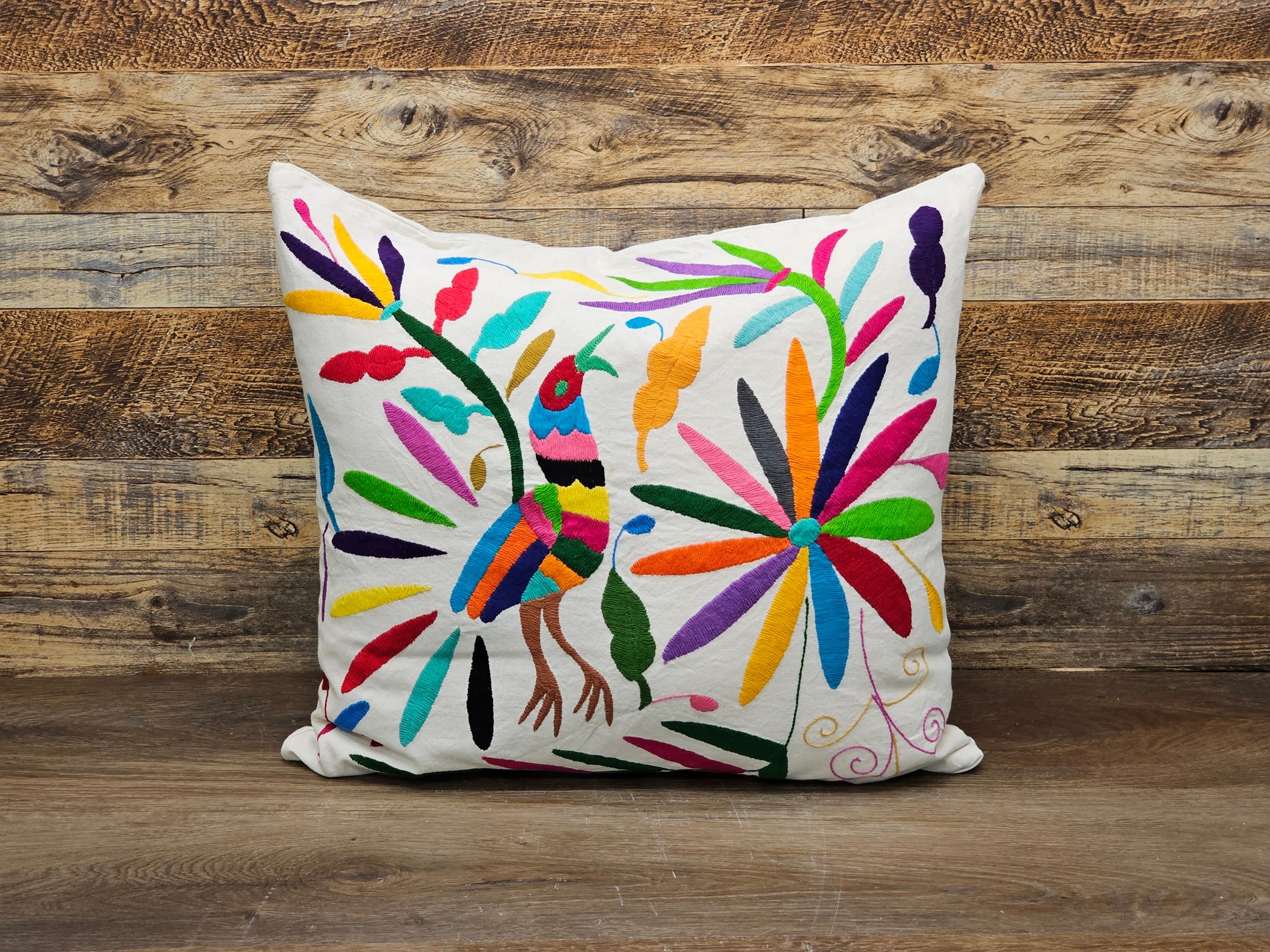 Rectangle Otomi Tenango Pillow Cover with Hand Embroidered Birds, Flowers, and Animals in Vibrant Colors. Handmade in Mexico. Ships from the USA. Buy now at www.felipeandgrace.com.
