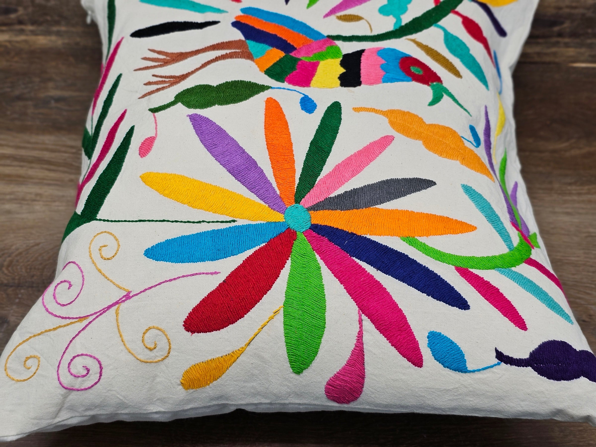 Rectangle Otomi Tenango Pillow Cover with Hand Embroidered Birds, Flowers, and Animals in Vibrant Colors. Handmade in Mexico. Ships from the USA. Buy now at www.felipeandgrace.com.