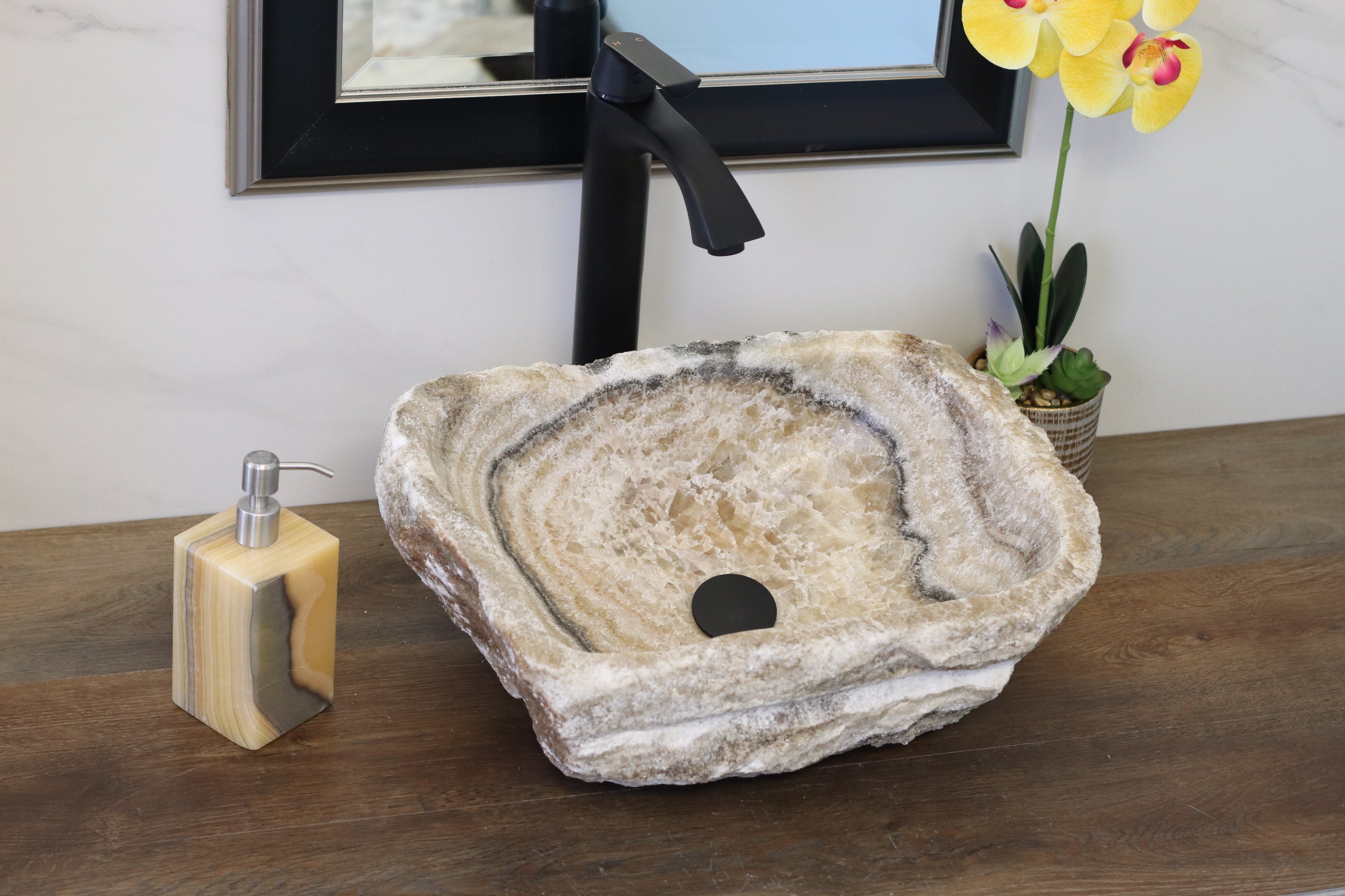 Brown and Beige Onyx Vessel Bathroom Sink. Irregular Shape. We offer fast shipping. Handmade in Mexico. We hand finish, package, and ship from the USA. Buy now at www.felipeandgrace.com.