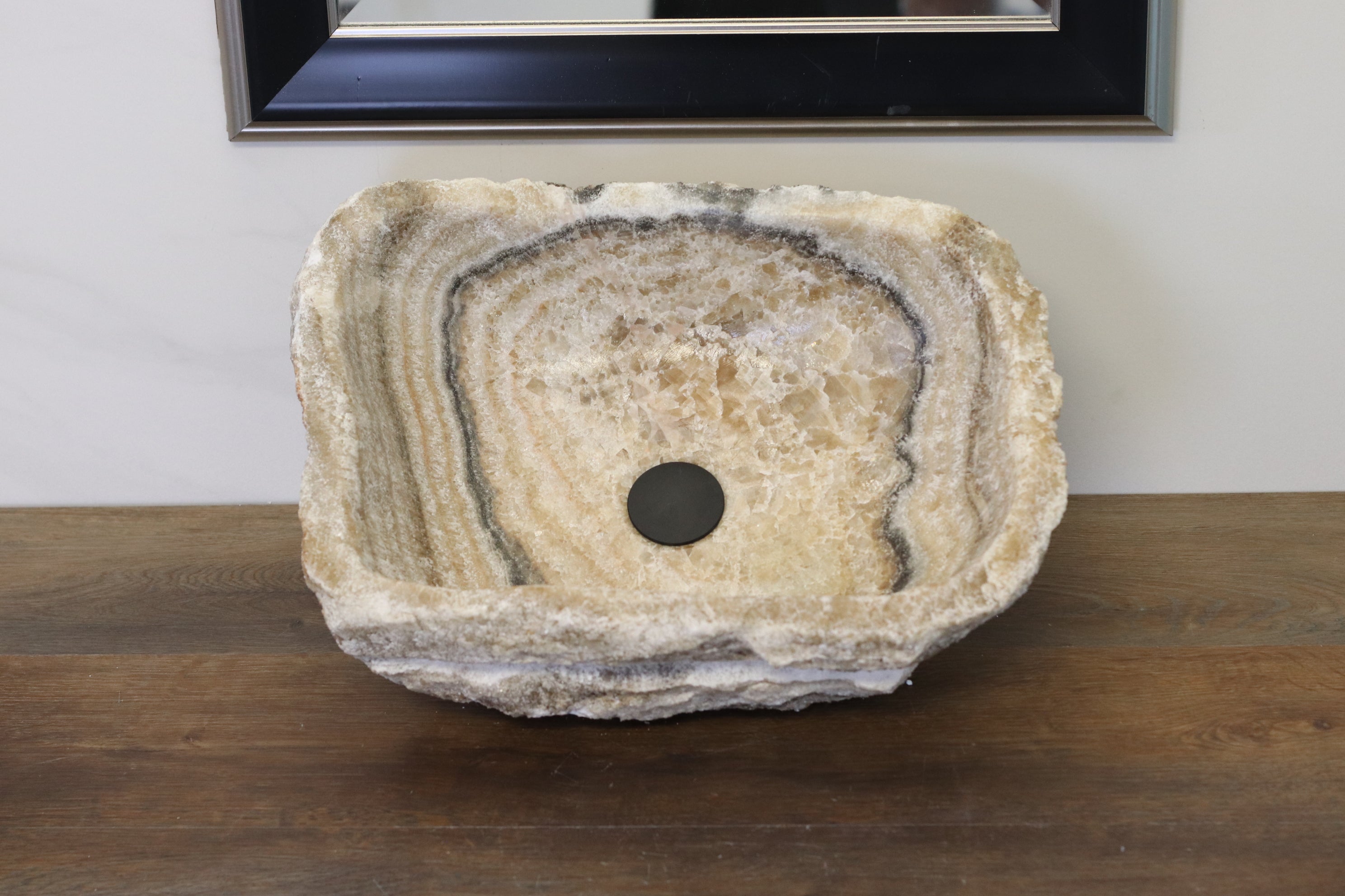 Brown and Beige Onyx Vessel Bathroom Sink. Irregular Shape. We offer fast shipping. Handmade in Mexico. We hand finish, package, and ship from the USA. Buy now at www.felipeandgrace.com.