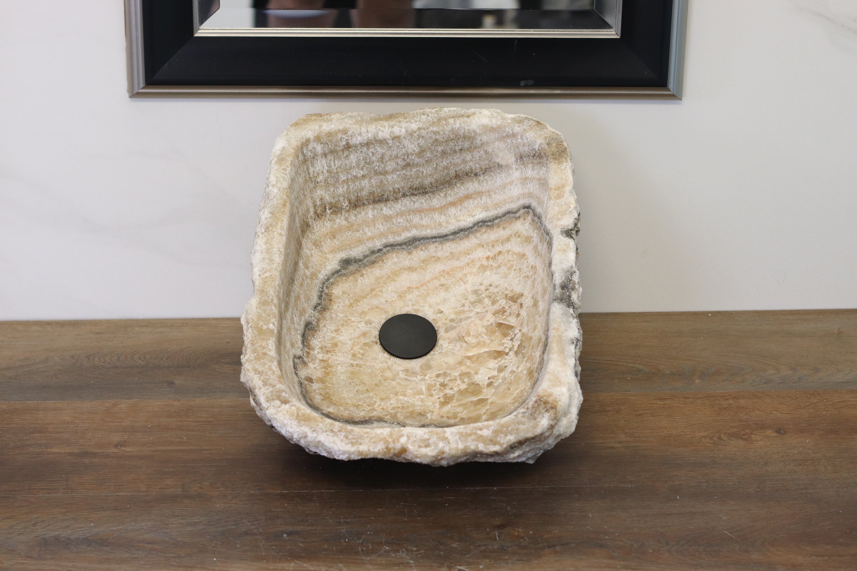 Brown and Beige Onyx Vessel Bathroom Sink. Irregular Shape. We offer fast shipping. Handmade in Mexico. We hand finish, package, and ship from the USA. Buy now at www.felipeandgrace.com.