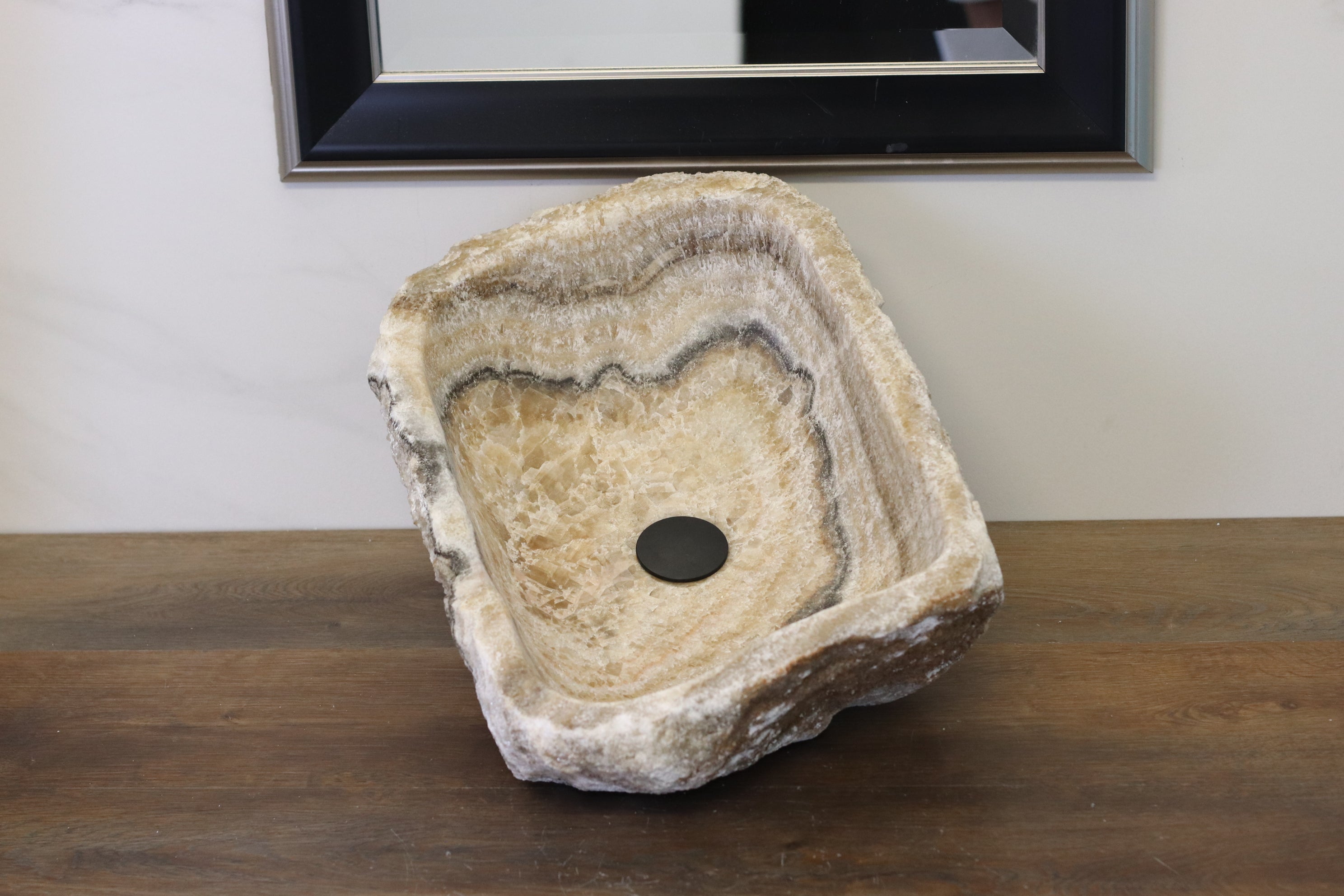 Brown and Beige Onyx Vessel Bathroom Sink. Irregular Shape. We offer fast shipping. Handmade in Mexico. We hand finish, package, and ship from the USA. Buy now at www.felipeandgrace.com.