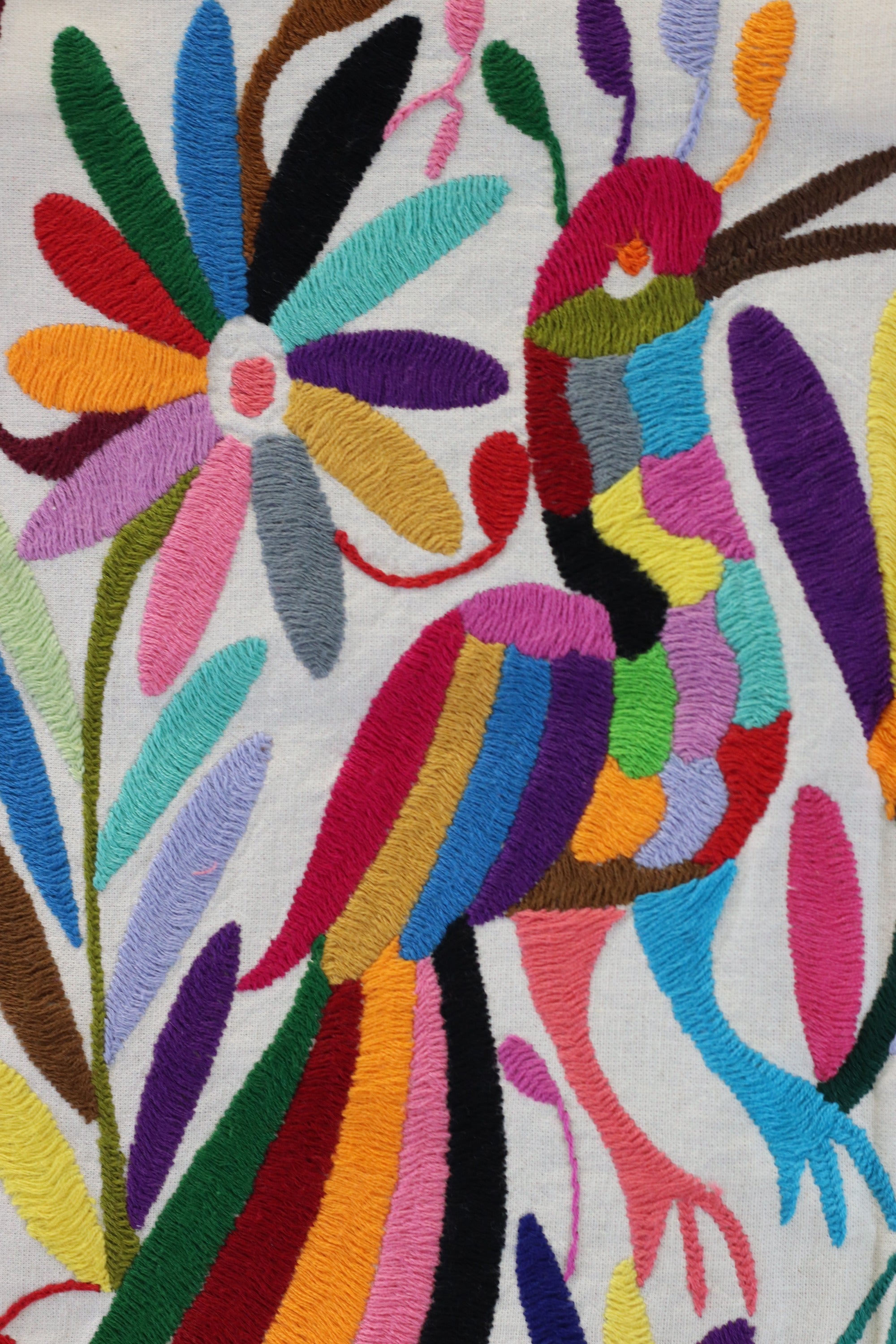 Otomi Tenango Placemat or Frameable Art Handmade with Embroidered Birds, Flowers, and Animals in Vibrant Colors. Handmade in Mexico. Ships from the USA. Buy now at www.felipeandgrace.com.