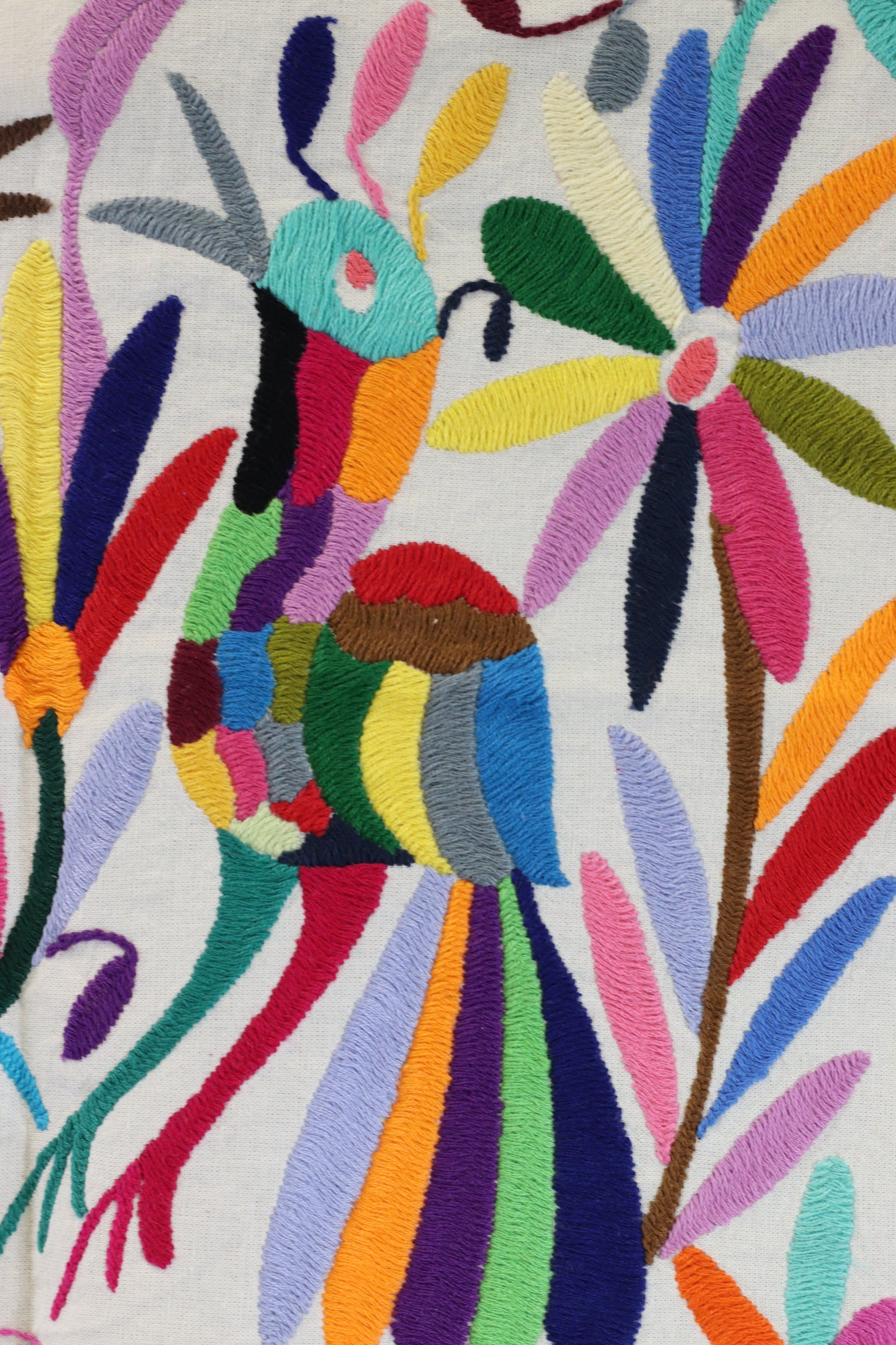 Otomi Tenango Placemat or Frameable Art Handmade with Embroidered Birds, Flowers, and Animals in Vibrant Colors. Handmade in Mexico. Ships from the USA. Buy now at www.felipeandgrace.com.