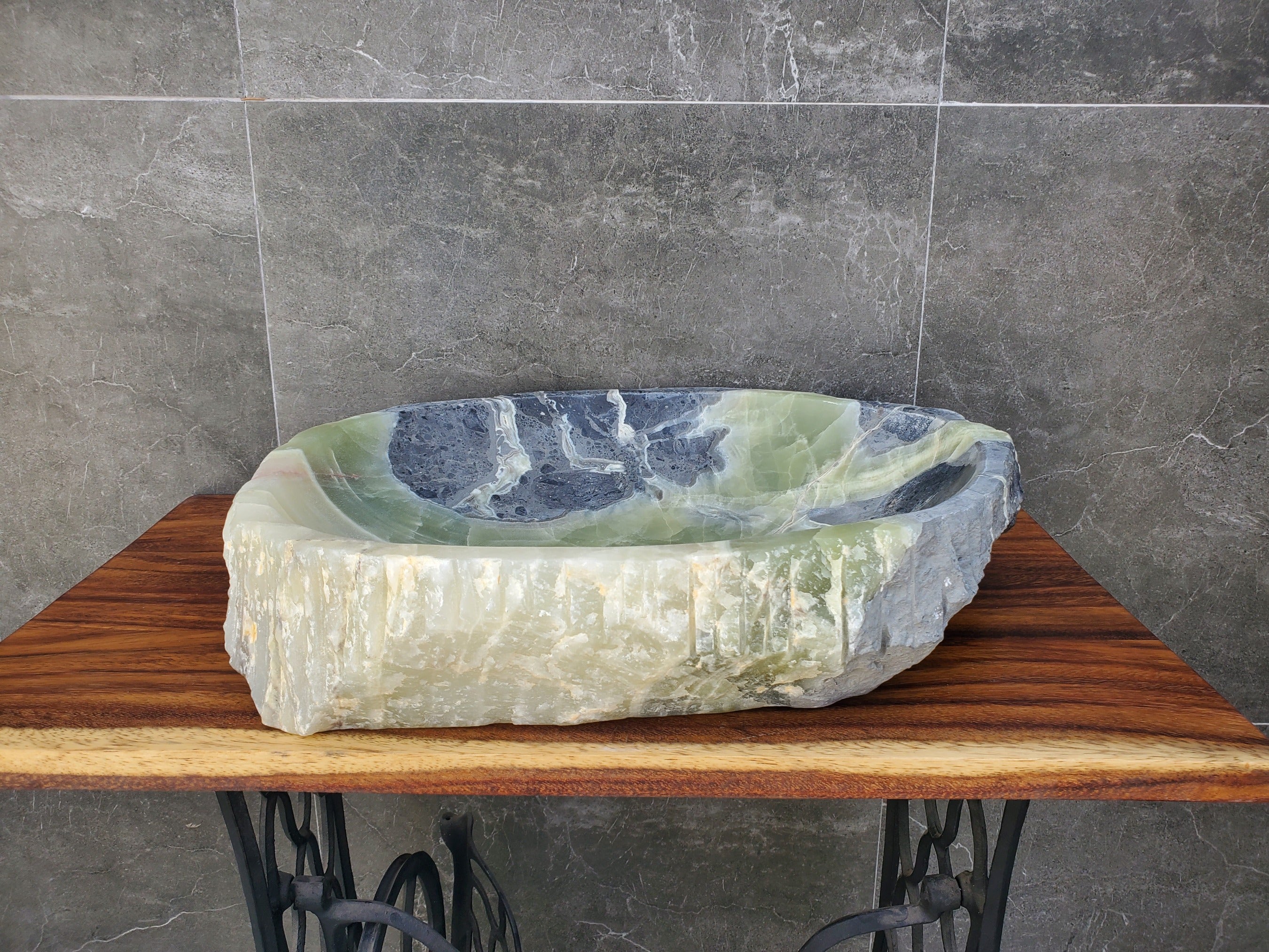 Green and Gray Onyx Stone Vessel Sink. It is one of a kind and a beautiful work of art. Handmade in Mexico. Hand Finished in the USA. Ships from the USA. A beautiful work of art. Buy now at www.felipeandgrace.com.