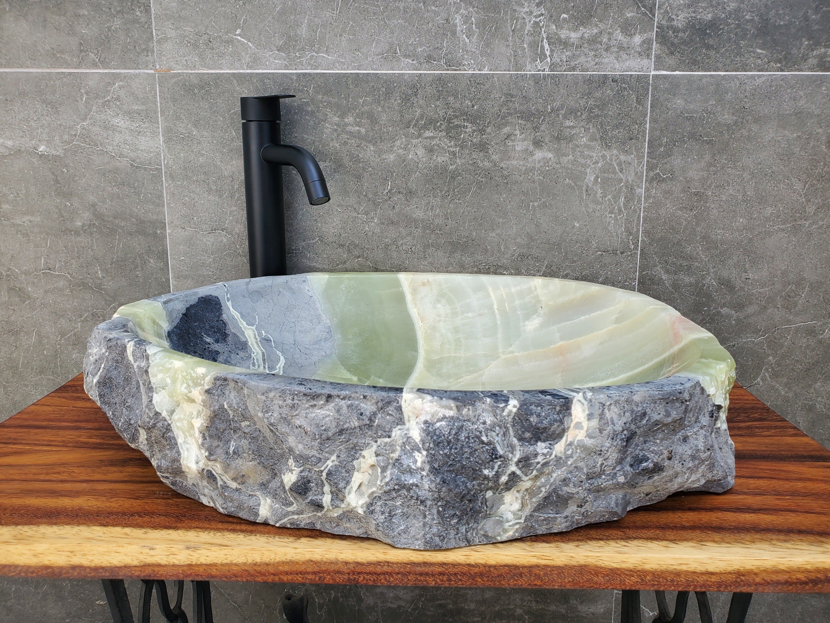 Green and Gray Onyx Stone Vessel Sink. It is one of a kind and a beautiful work of art. Handmade in Mexico. Hand Finished in the USA. Ships from the USA. A beautiful work of art. Buy now at www.felipeandgrace.com.