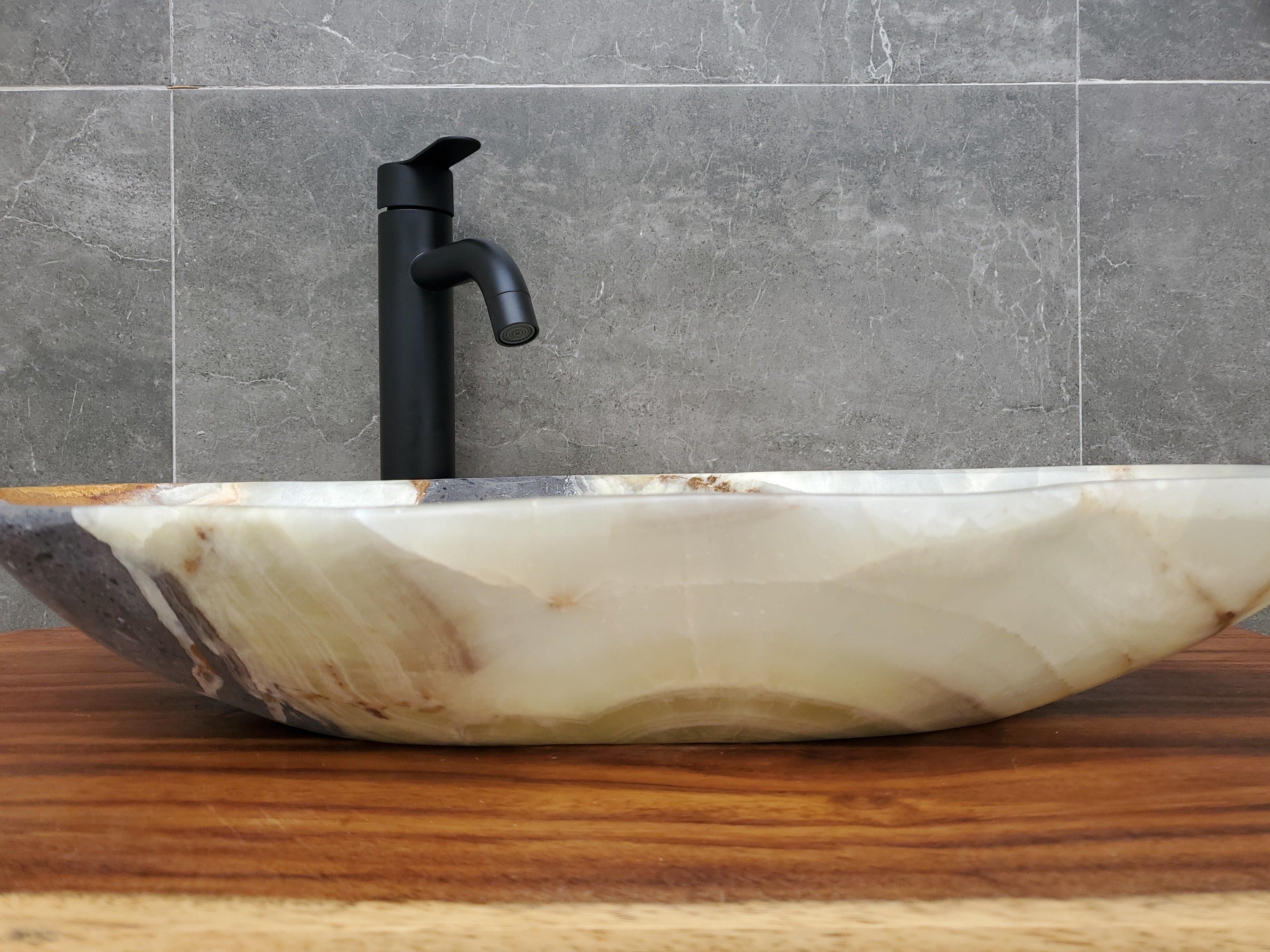 Green and Gray Onyx Stone Bathroom Vessel Sink. Option to Customize Drain Size. A beautiful work of art. We offer fast shipping. Handmade in Mexico. We hand finish, package, and ship from the USA. Buy now at www.felipeandgrace.com.