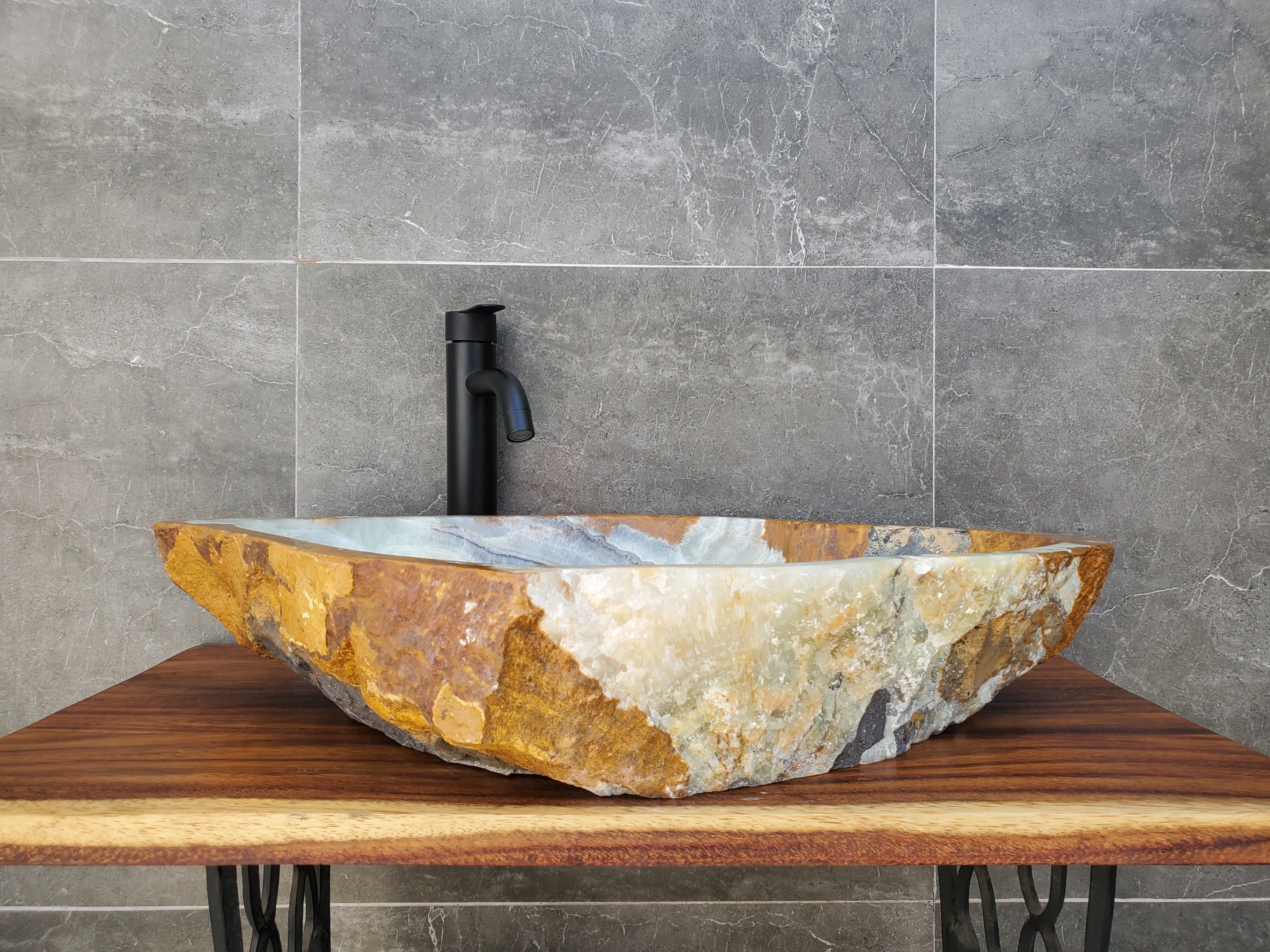Green, Gray and Brown Onyx Stone Vessel Sink. It is one of a kind. Handmade in Mexico. Hand Finished in the USA. Ships from the USA. A beautiful work of art. Buy now at www.felipeandgrace.com.