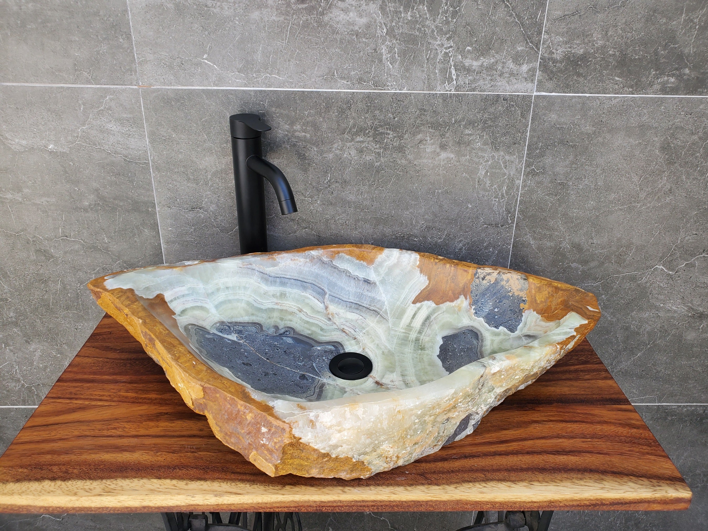 Green, Gray and Brown Onyx Stone Vessel Sink. It is one of a kind. Handmade in Mexico. Hand Finished in the USA. Ships from the USA. A beautiful work of art. Buy now at www.felipeandgrace.com.