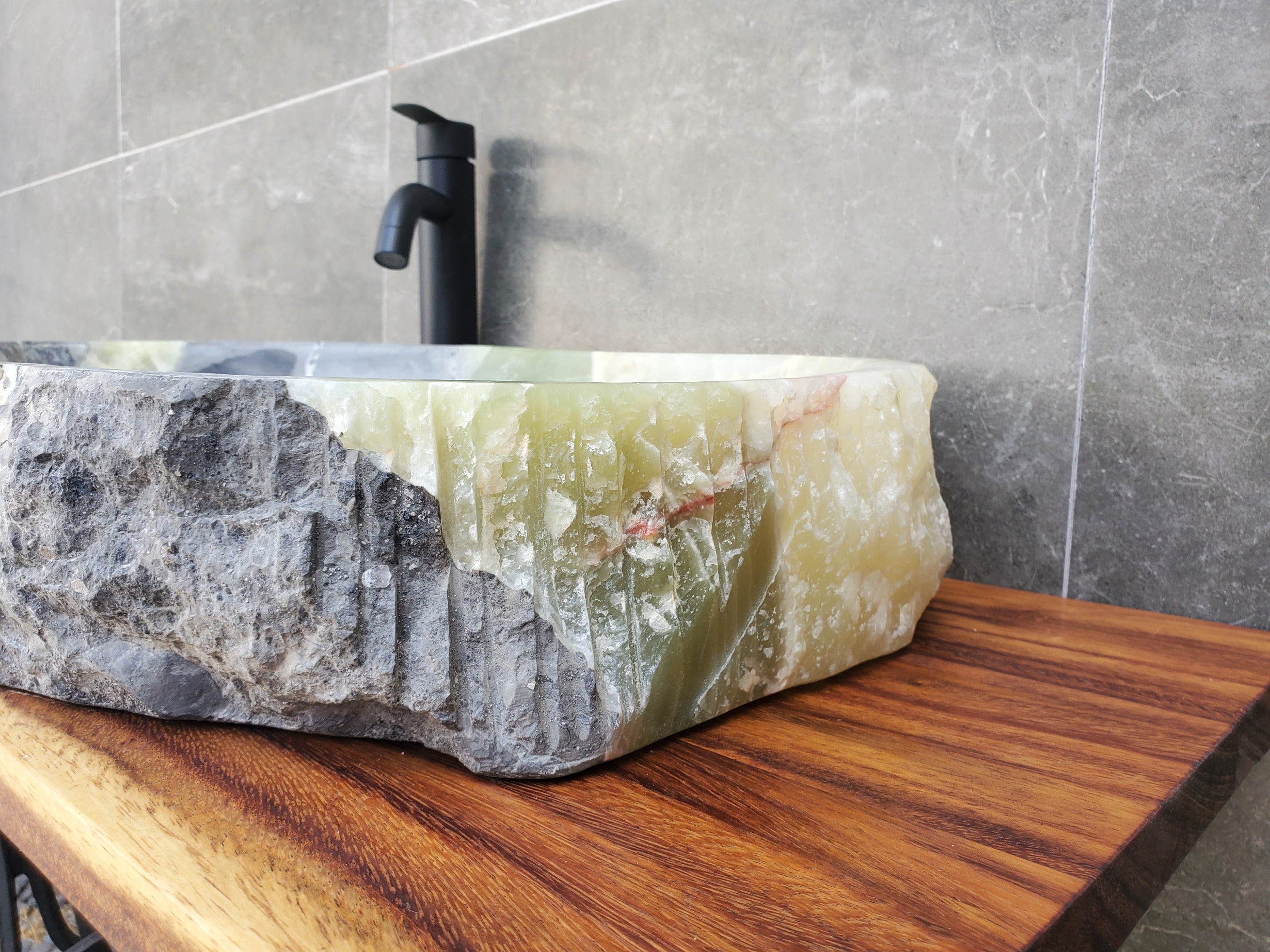 Green and Gray Onyx Stone Vessel Sink. It is one of a kind and a beautiful work of art. Handmade in Mexico. Hand Finished in the USA. Ships from the USA. A beautiful work of art. Buy now at www.felipeandgrace.com.