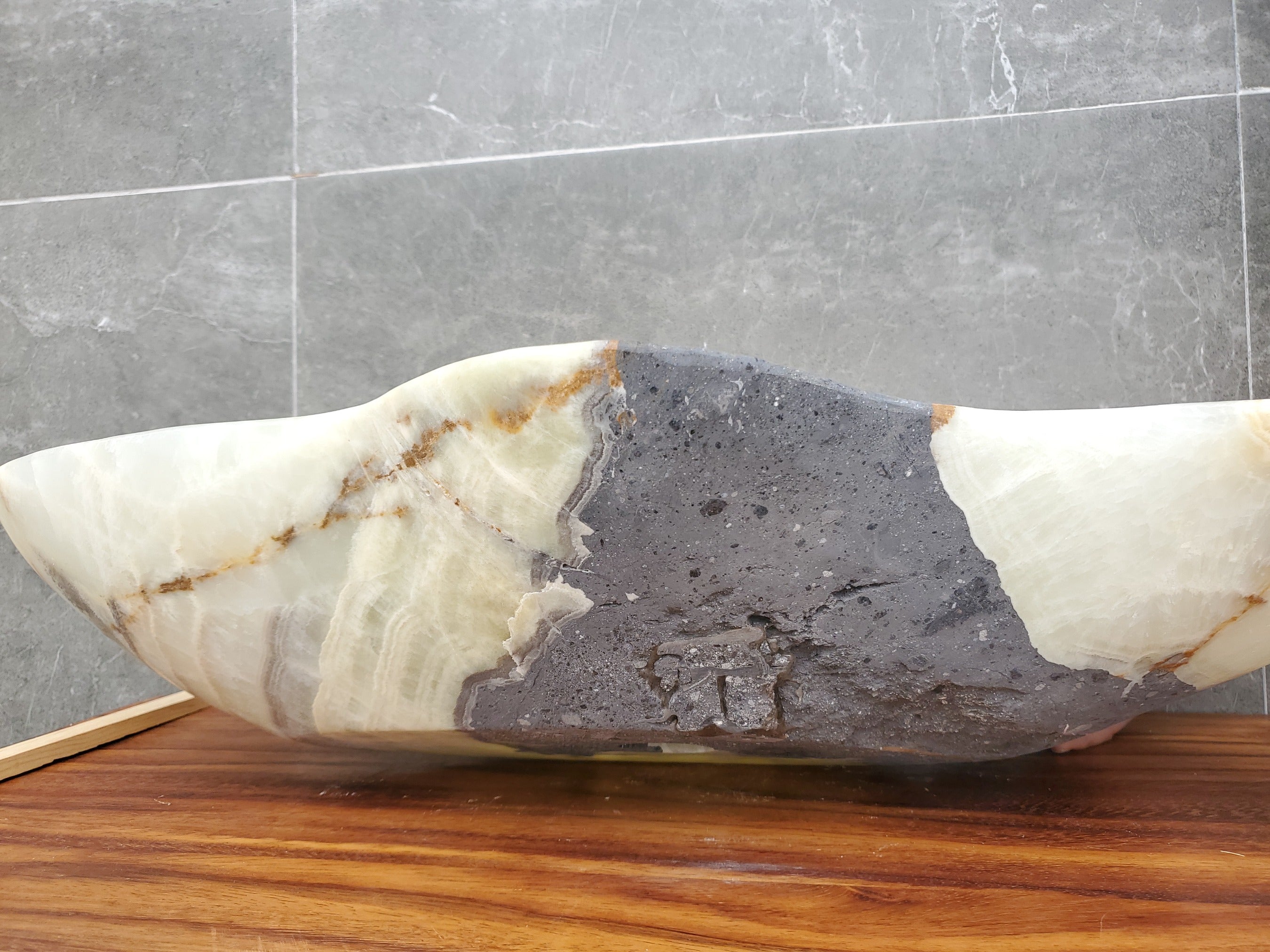 Green and Gray Onyx Stone Bathroom Vessel Sink. Option to Customize Drain Size. A beautiful work of art. We offer fast shipping. Handmade in Mexico. We hand finish, package, and ship from the USA. Buy now at www.felipeandgrace.com.
