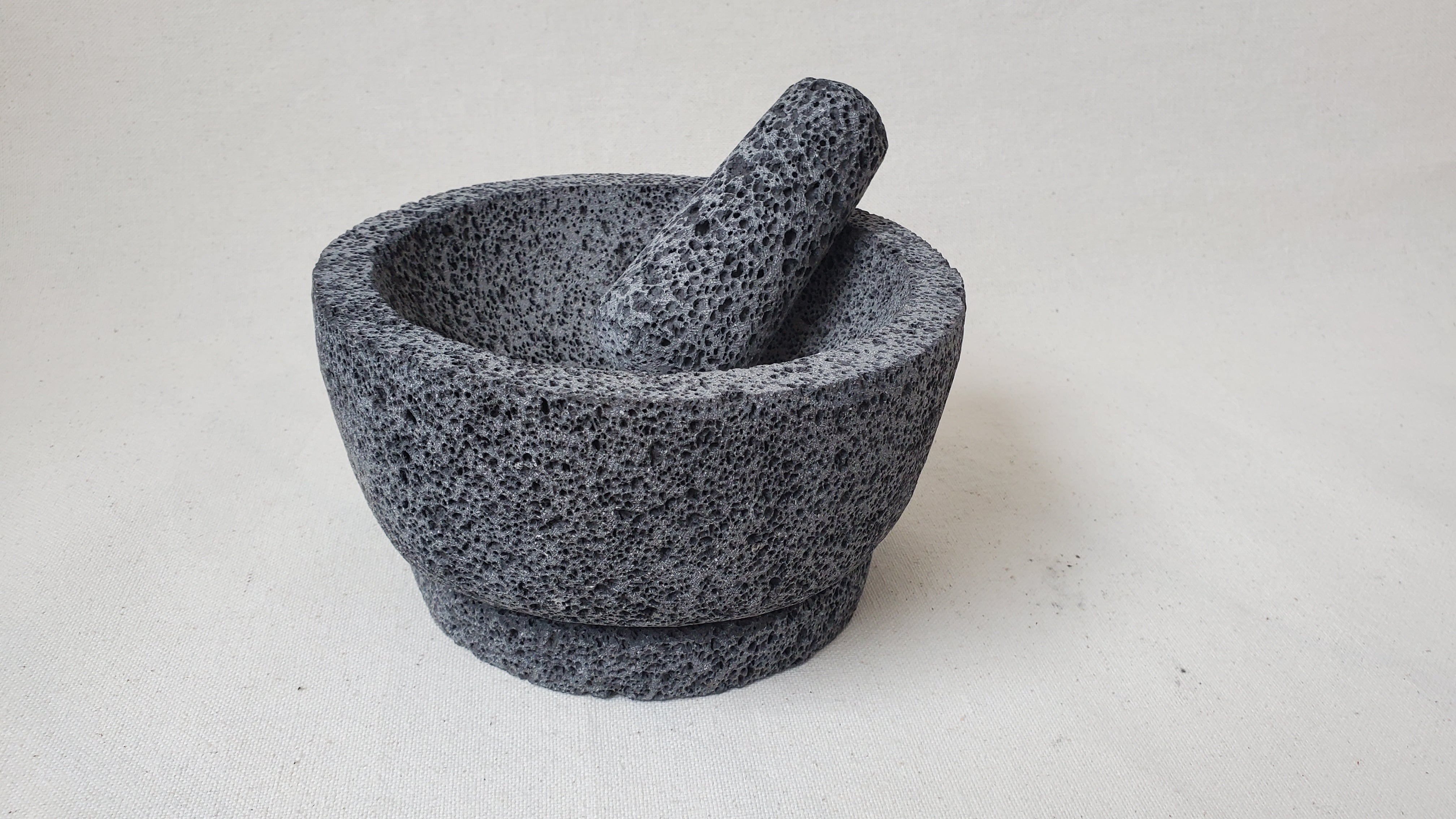 Authentic 8-inch Molcajete Pestle and Mortar Set. Made of pure basalt volcanic lava rock. Handmade in Mexico using traditional techniques. We hand finish, package, and ship from the USA. Buy now at www.felipeandgrace.com.