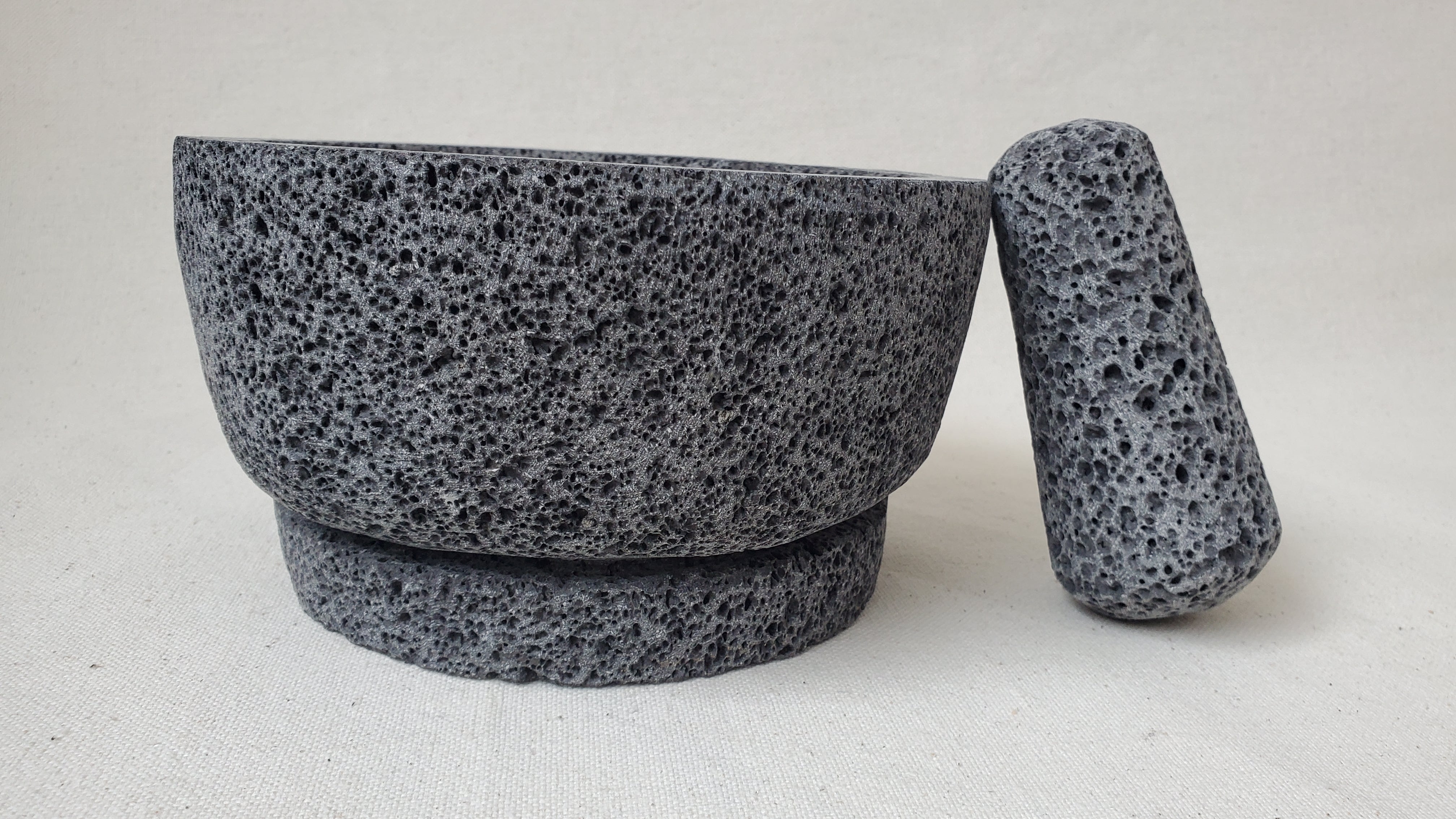 Authentic 8-inch Molcajete Pestle and Mortar Set. Made of pure basalt volcanic lava rock. Handmade in Mexico using traditional techniques. We hand finish, package, and ship from the USA. Buy now at www.felipeandgrace.com.