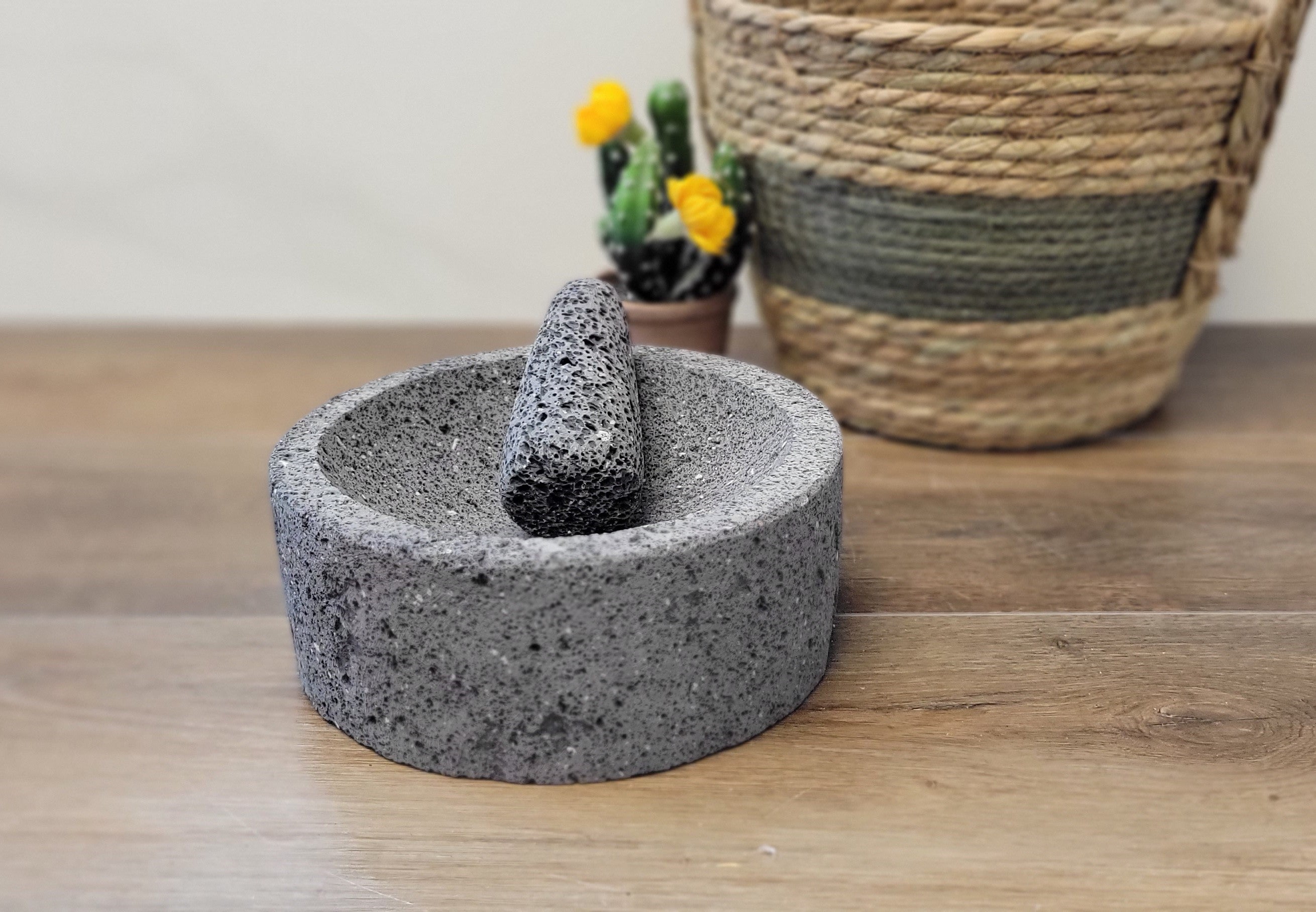 8 Inch Molcajete Bowl with Pestle made of Basalt Lava Rock. Handmade in Mexico. We hand finish, package, and ship from the USA. Buy now at www.felipeandgrace.com.