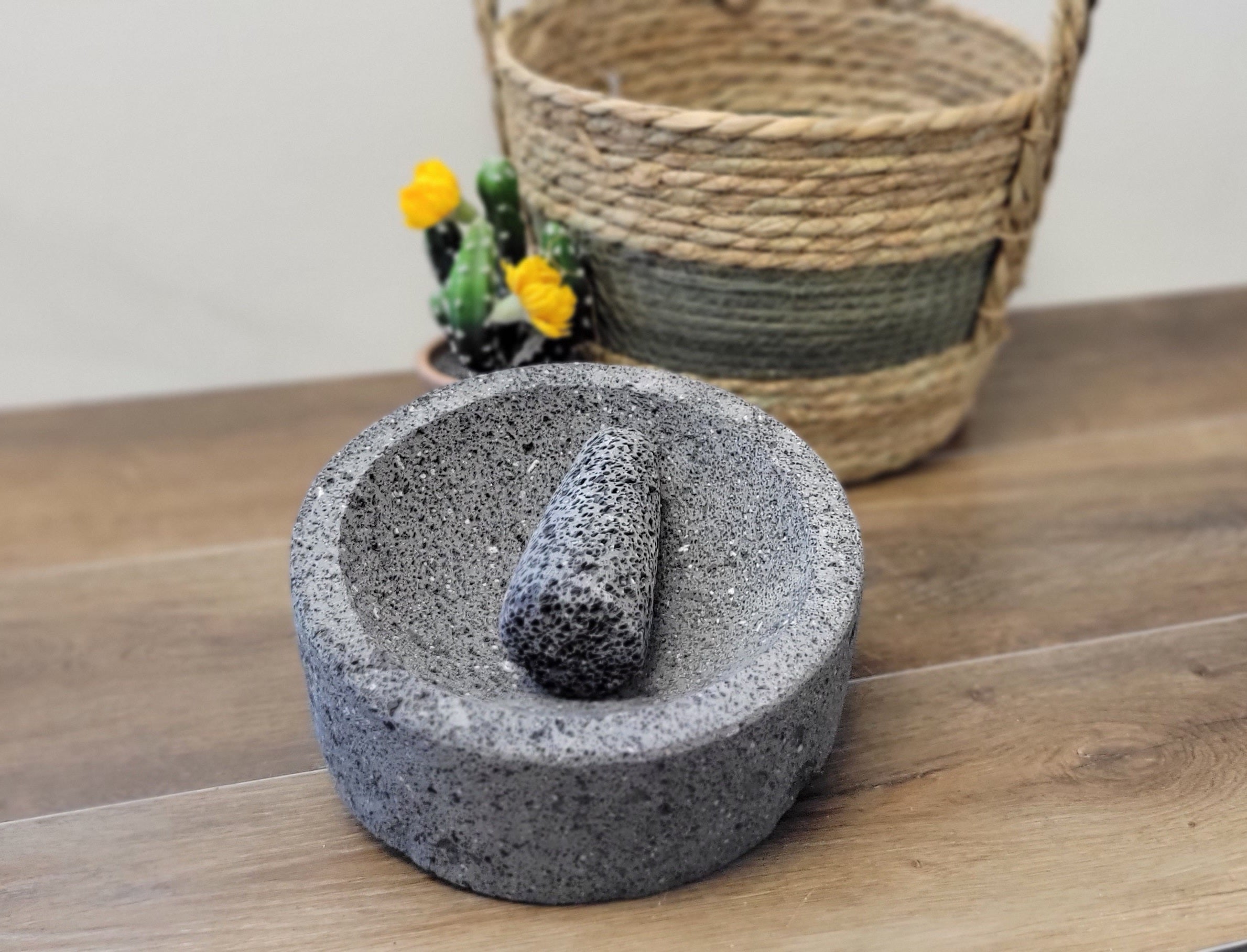 8 Inch Molcajete Bowl with Pestle made of Basalt Lava Rock. Handmade in Mexico. We hand finish, package, and ship from the USA. Buy now at www.felipeandgrace.com.