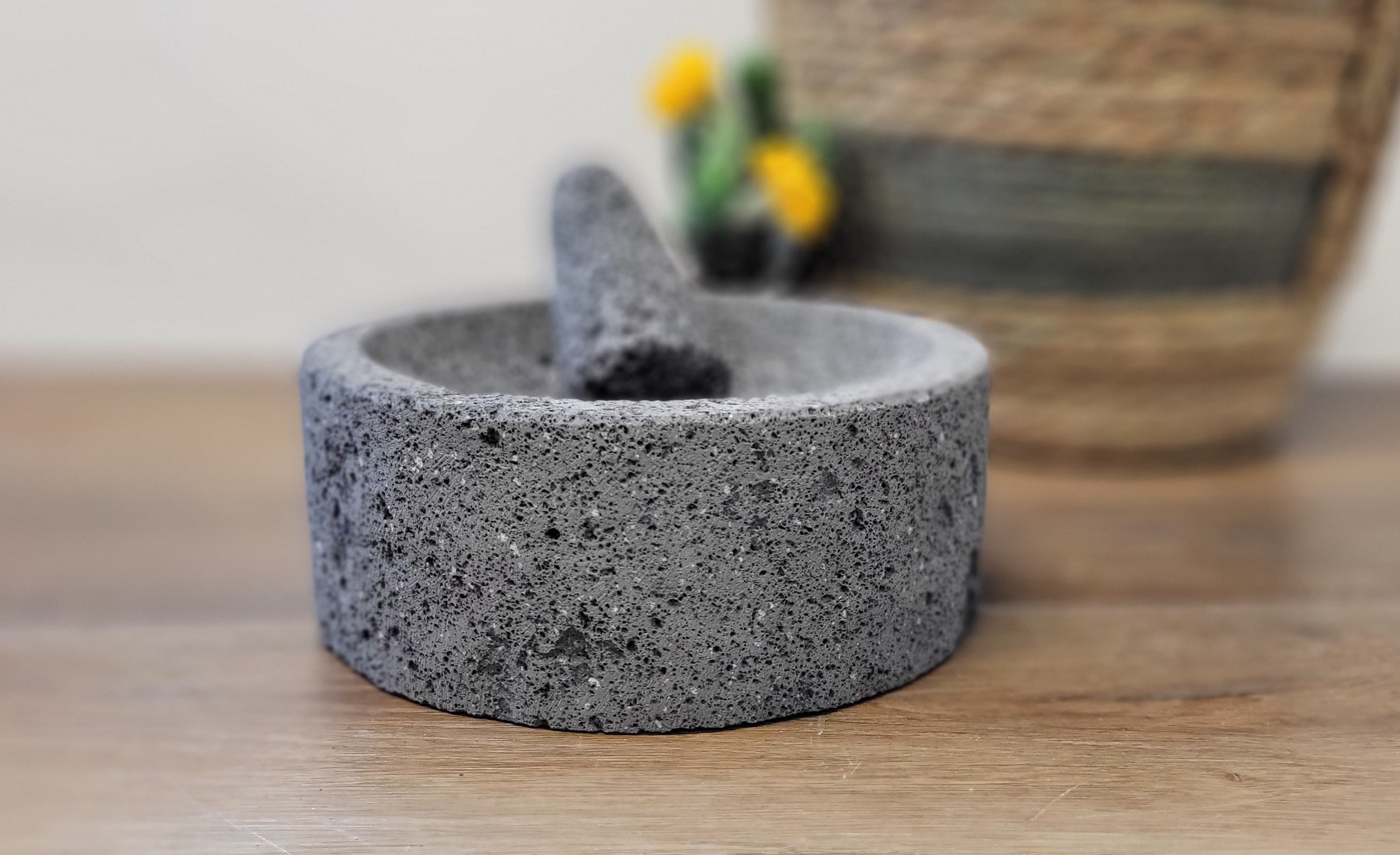 8 Inch Molcajete Bowl with Pestle made of Basalt Lava Rock. Handmade in Mexico. We hand finish, package, and ship from the USA. Buy now at www.felipeandgrace.com.