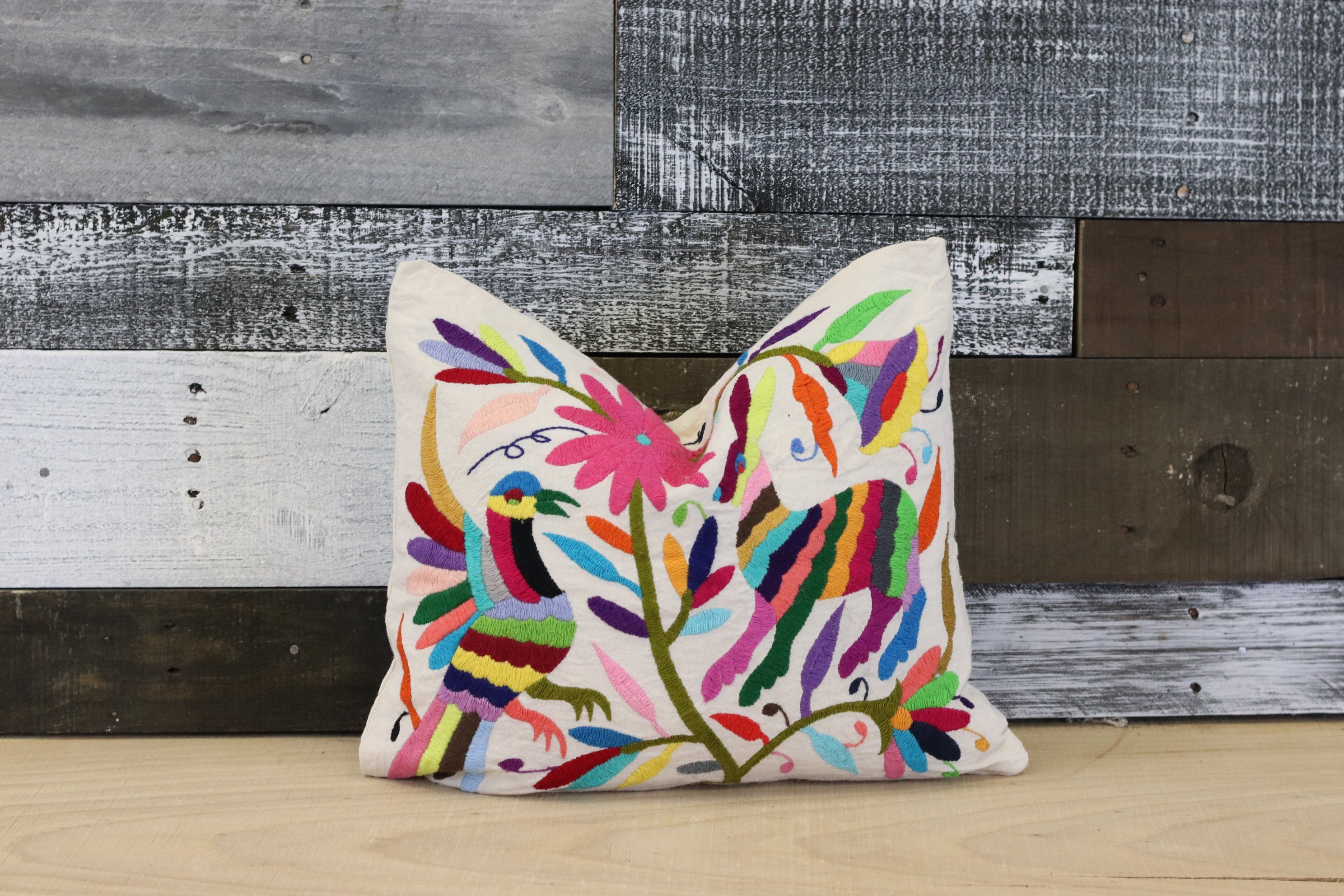 Rectangle Otomi Tenango Pillow Cover with Hand Embroidered Birds, Flowers, and Animals in Vibrant Colors. Handmade in Mexico. Ships from the USA. Buy now at www.felipeandgrace.com.