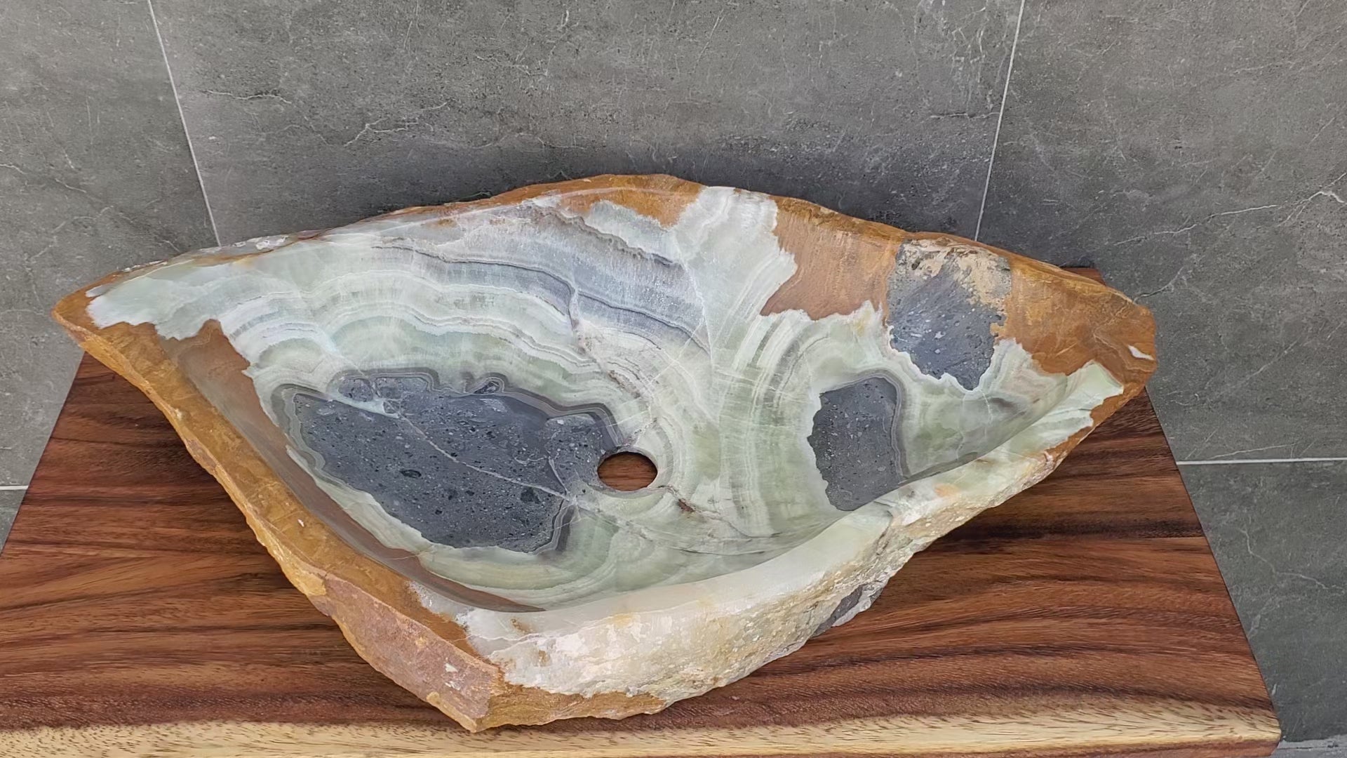 Green, Gray and Brown Onyx Stone Vessel Sink. It is one of a kind. Handmade in Mexico. Hand Finished in the USA. Ships from the USA. A beautiful work of art. Buy now at www.felipeandgrace.com.