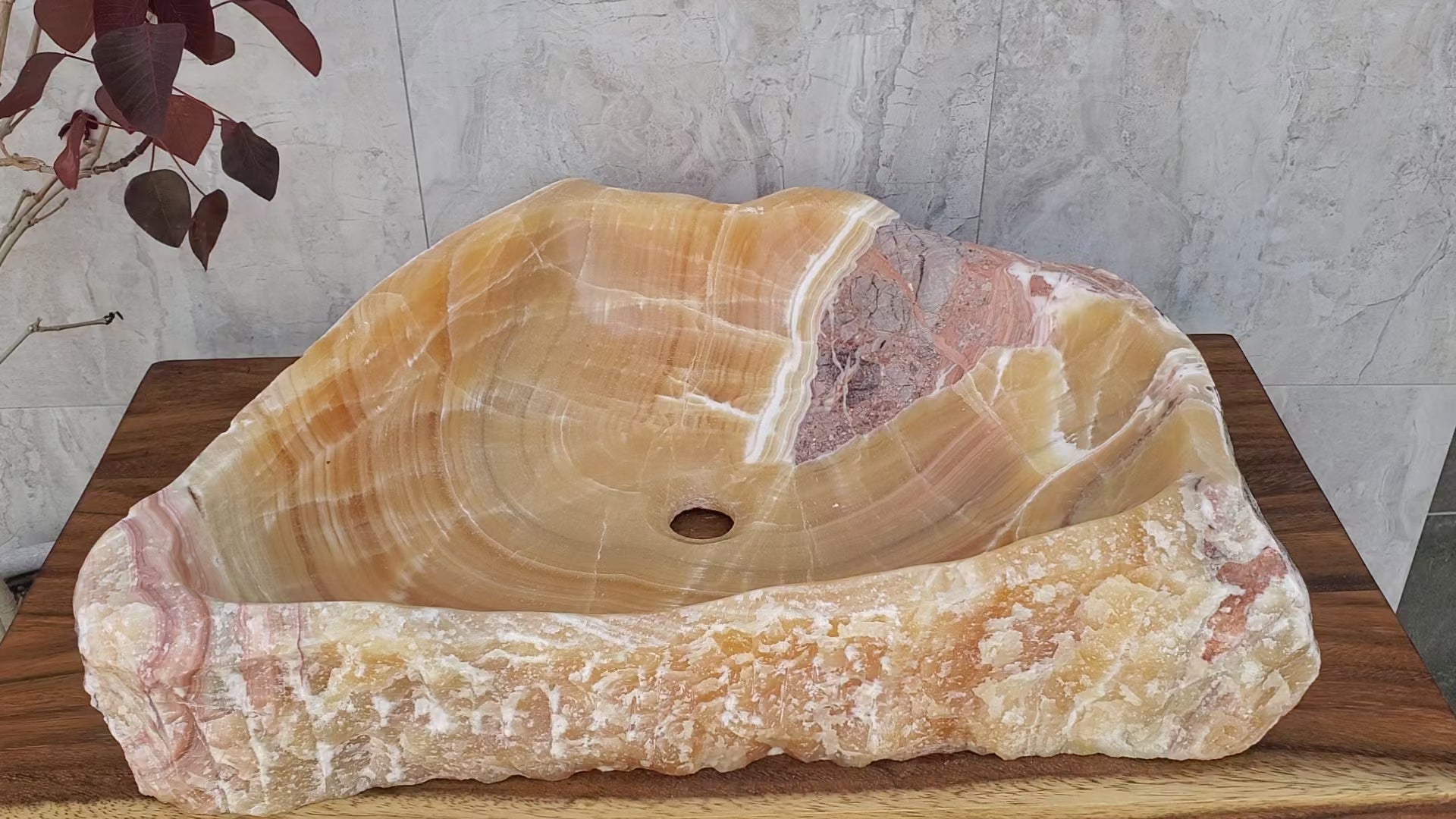 Orange and Pink Onyx Stone Vessel Sink. Handmade in Mexico. Ships from the USA. Buy now at www.felipeandgrace.com.