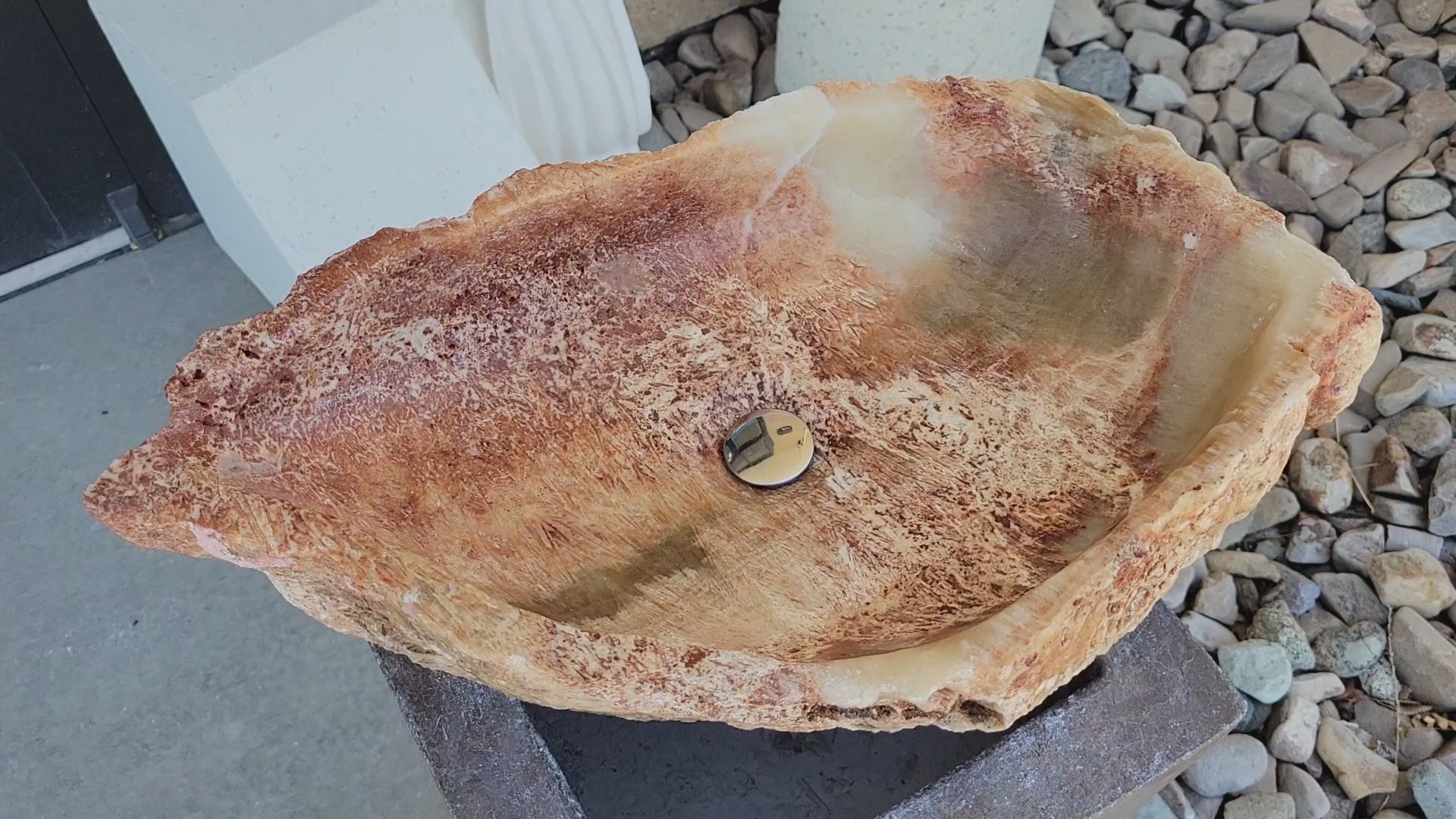 Pink, Red, and Ivory Onyx Stone Vessel Sink. A rustic, beautiful work of art. We offer fast shipping. Handmade in Mexico. We hand finish, package, and ship from the USA. Buy now at www.felipeandgrace.com.