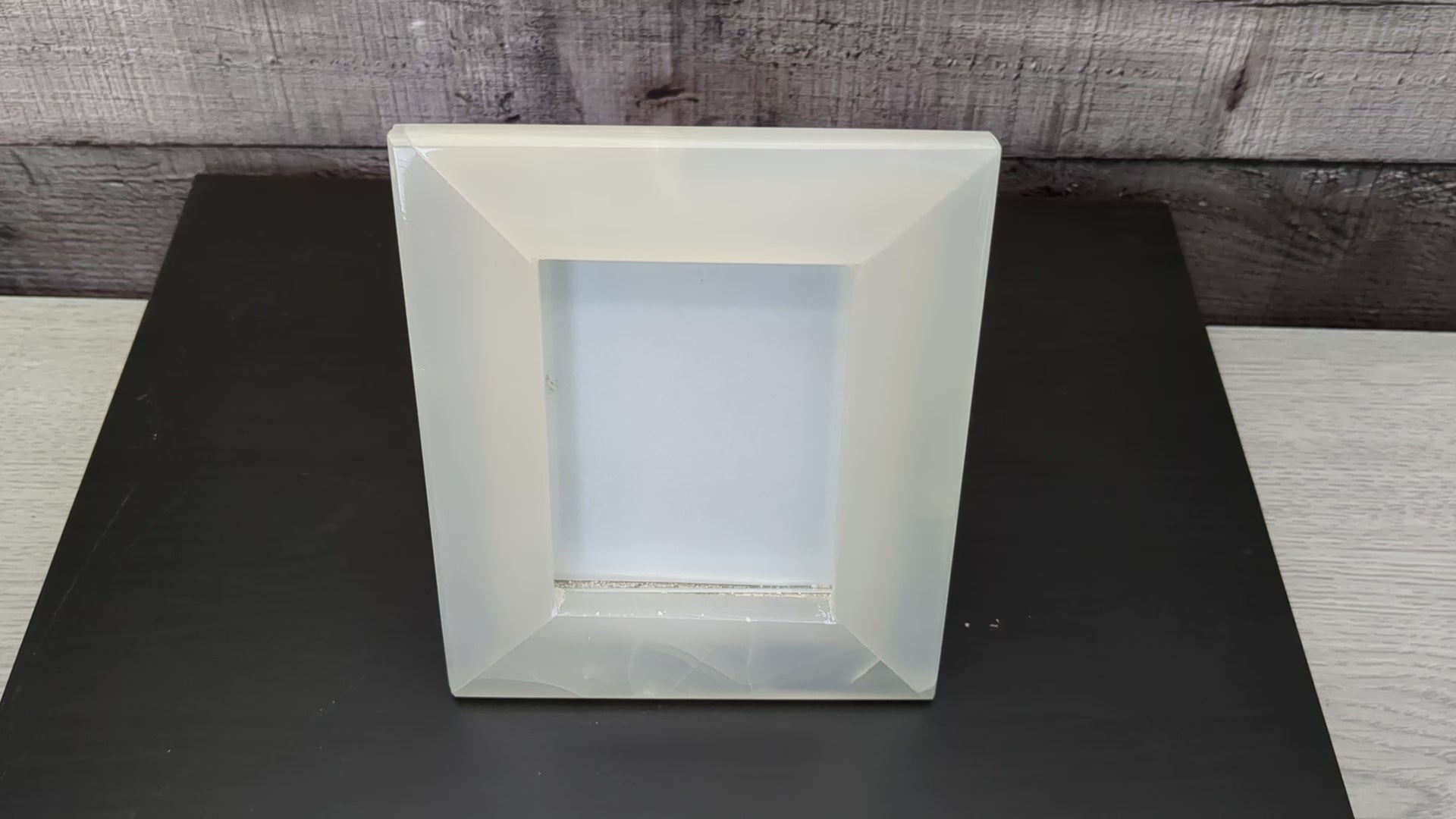 White Onyx Frame with Glass Covering and Travertine Stone Stand. Handmade in Mexico. We package and ship from the USA. Buy now at www.felipeandgrace.com.