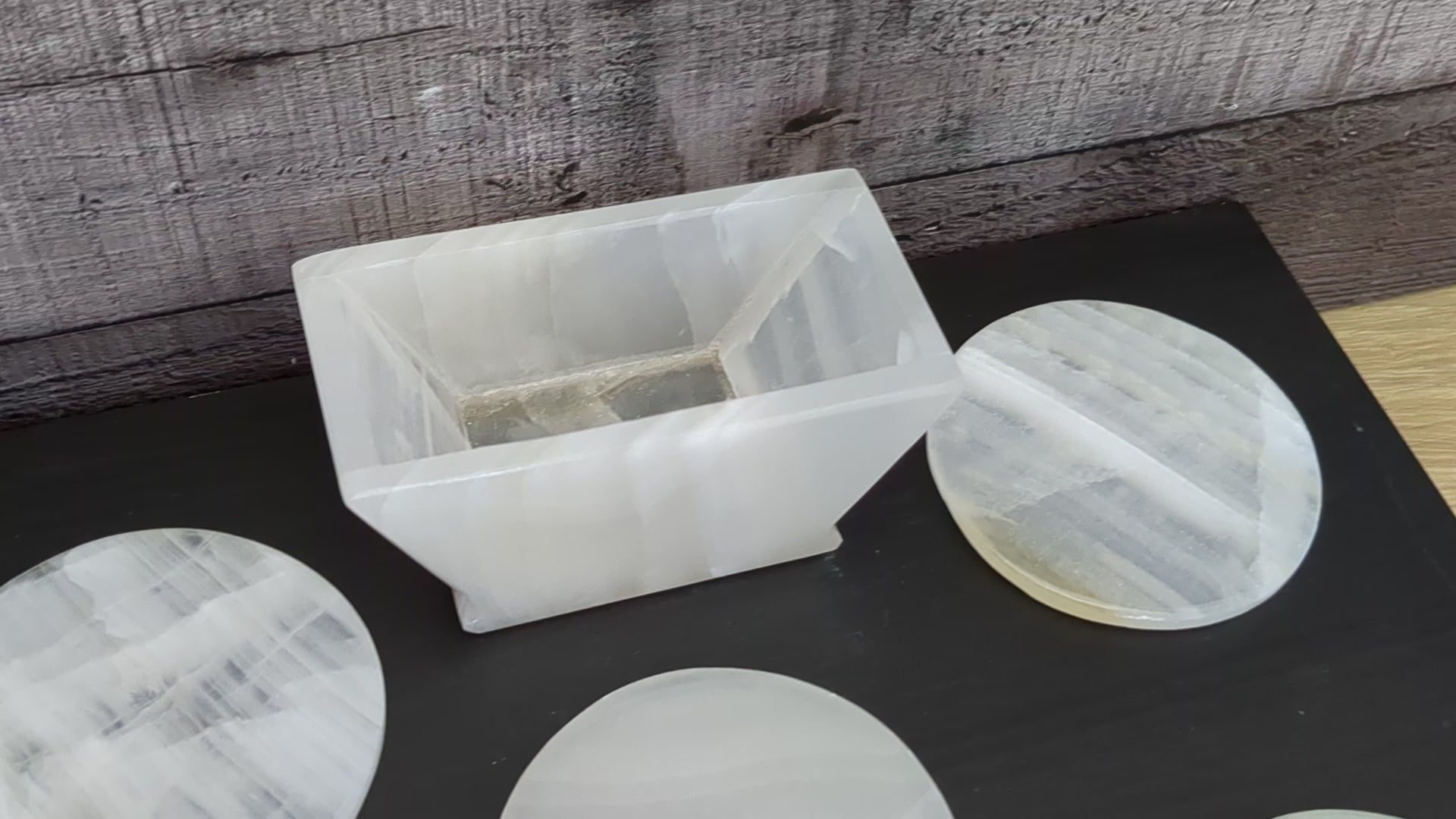 White Onyx Coaster Set of Six with Holder. The coasters are round. Handmade in Mexico. Ships from the USA. Buy now at www.felipeandgrace.com.