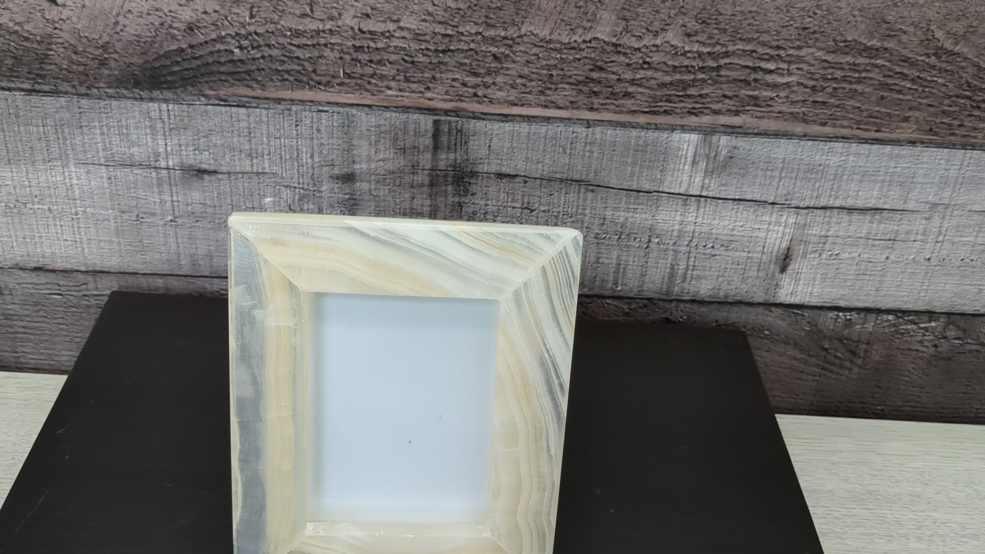 White Onyx Frame with Glass Covering and Travertine Stone Stand. Handmade in Mexico. We package and ship from the USA. Buy now at www.felipeandgrace.com.