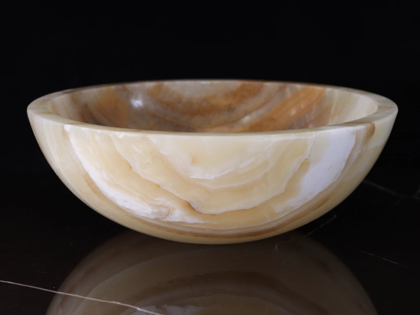 Brown and Tan Onyx Stone Vessel Sink. Made to sit above the counter. This sink has a polished finish. We hand finish, package, and ship from the USA. Buy now at www.felipeandgrace.com.