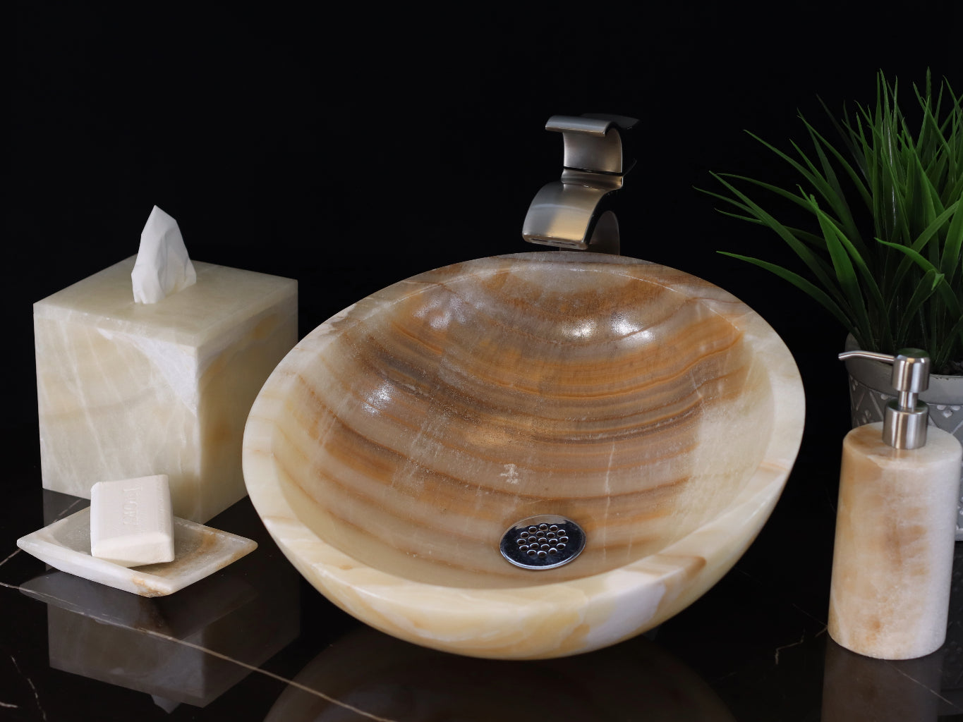 Brown and Tan Onyx Stone Vessel Sink. Made to sit above the counter. This sink has a polished finish. We hand finish, package, and ship from the USA. Buy now at www.felipeandgrace.com.