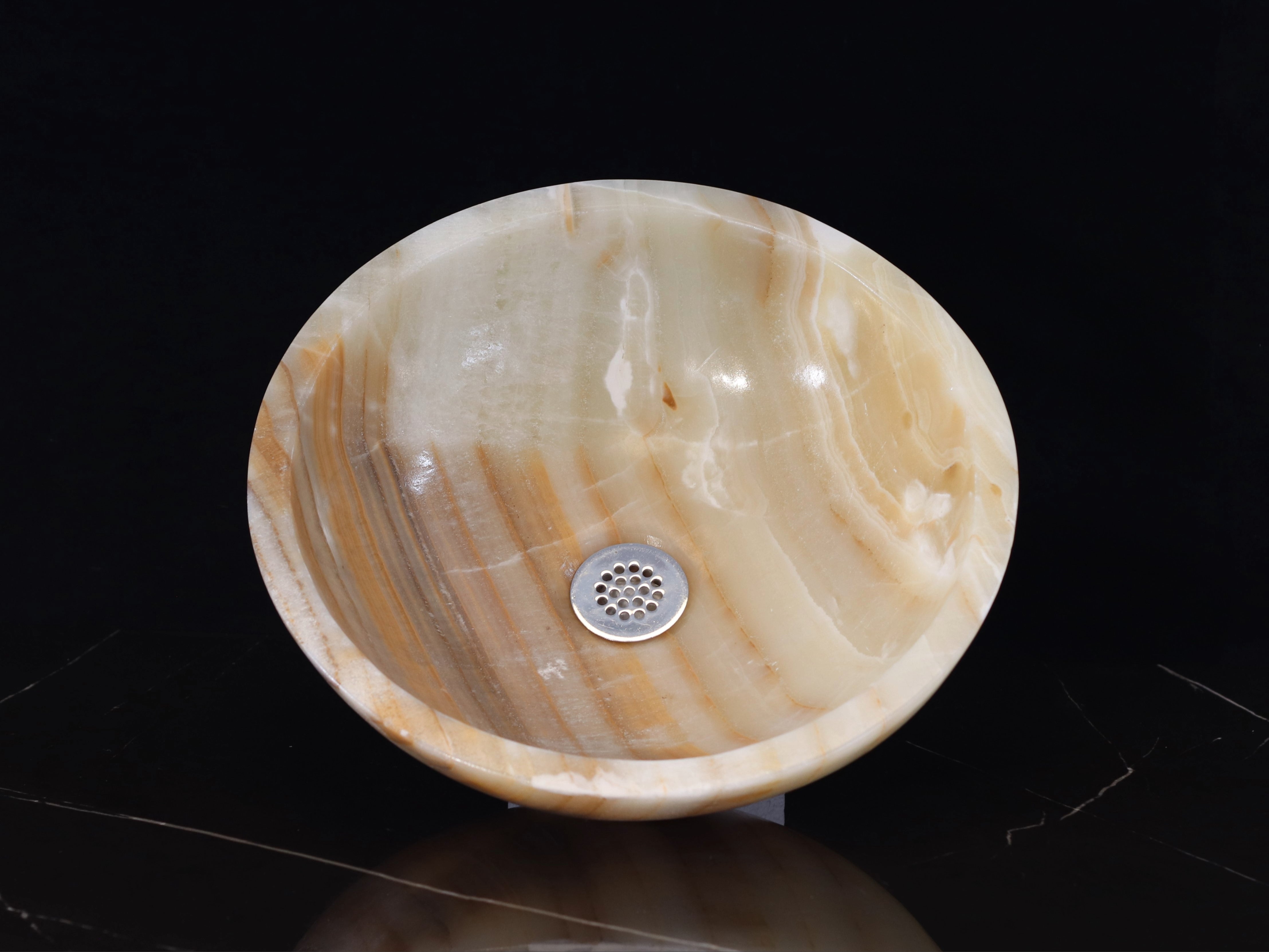 Brown and Tan Onyx Stone Vessel Sink. Made to sit above the counter. This sink has a polished finish. We hand finish, package, and ship from the USA. Buy now at www.felipeandgrace.com.