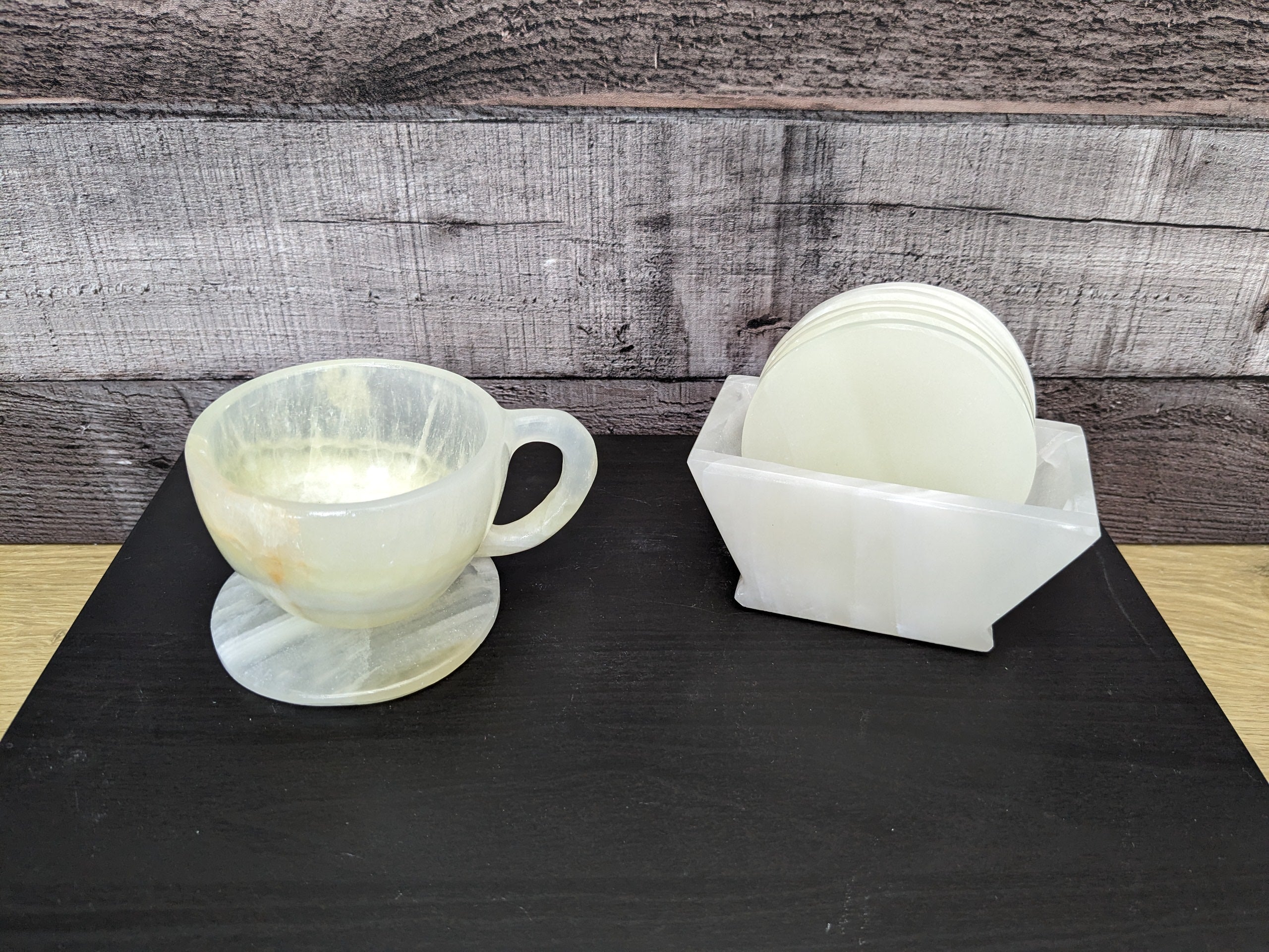 White Onyx Coaster Set of Six with Holder. The coasters are round. Handmade in Mexico. Ships from the USA. Buy now at www.felipeandgrace.com.