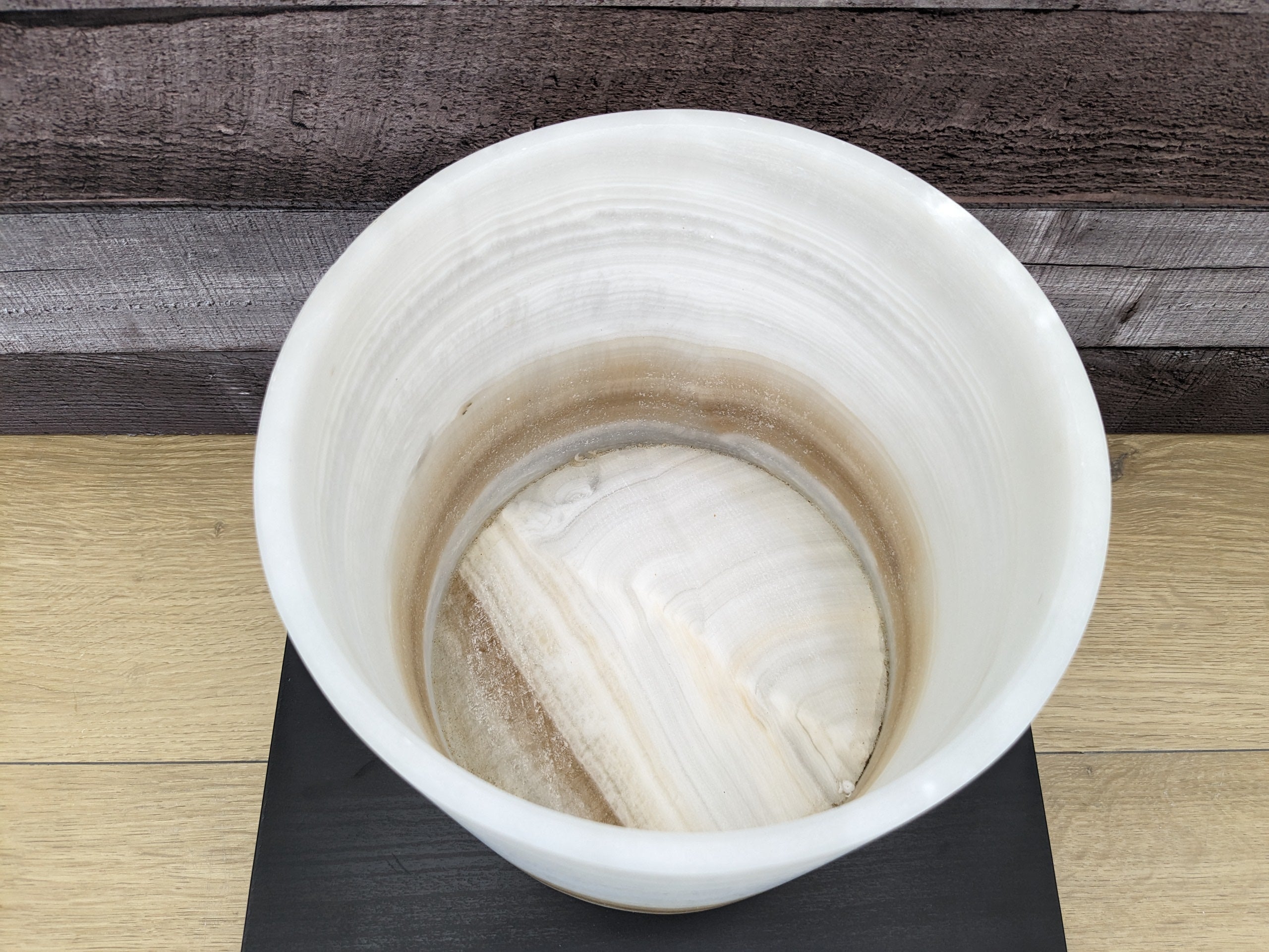 White Onyx Stone Trash Receptacle with Brown Stripe near Bottom. Handmade in Mexico. Ships from the USA. Buy now at www.felipeandgrace.com.
