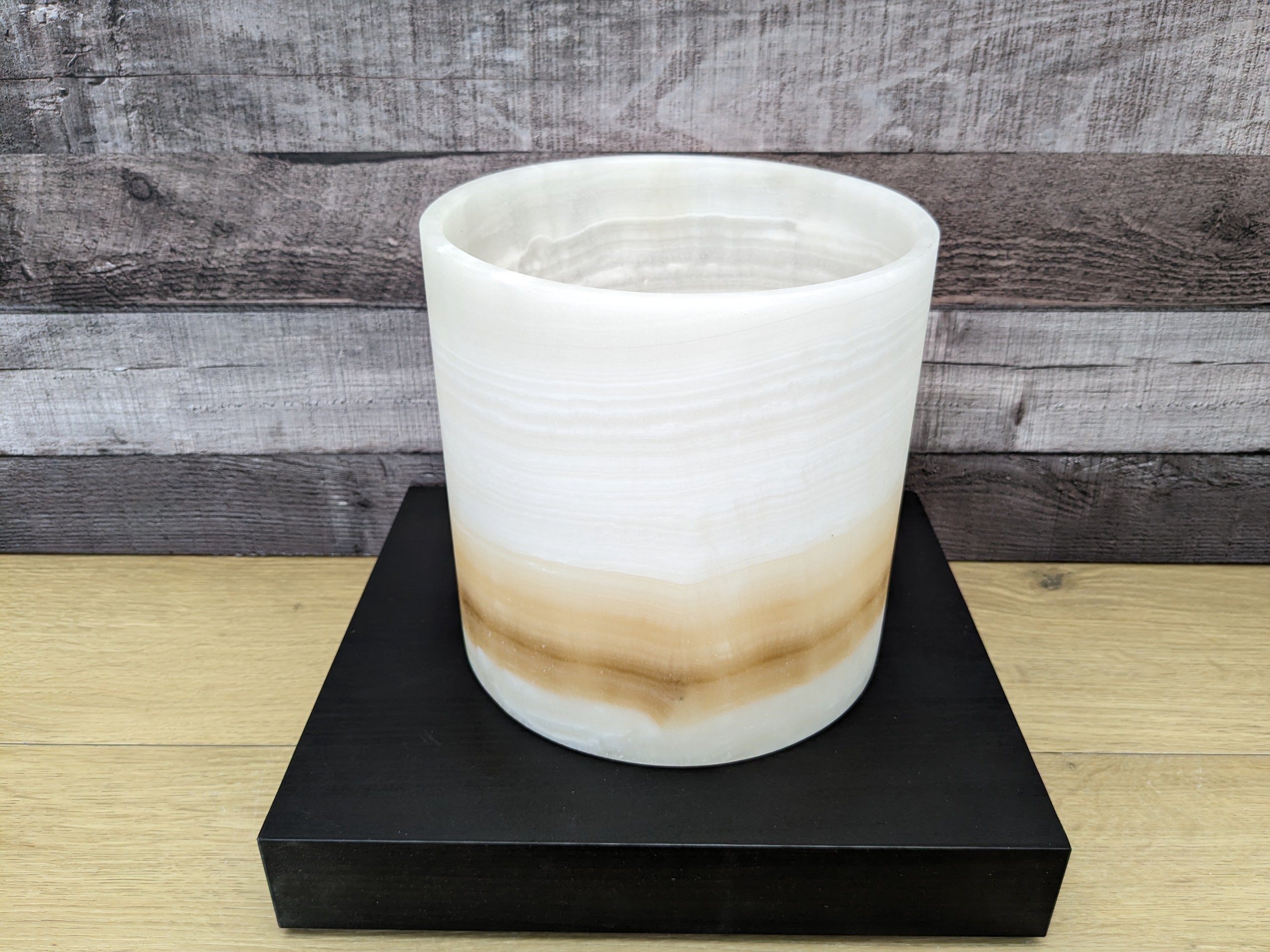 White Onyx Stone Trash Receptacle with Brown Stripe near Bottom. Handmade in Mexico. Ships from the USA. Buy now at www.felipeandgrace.com.