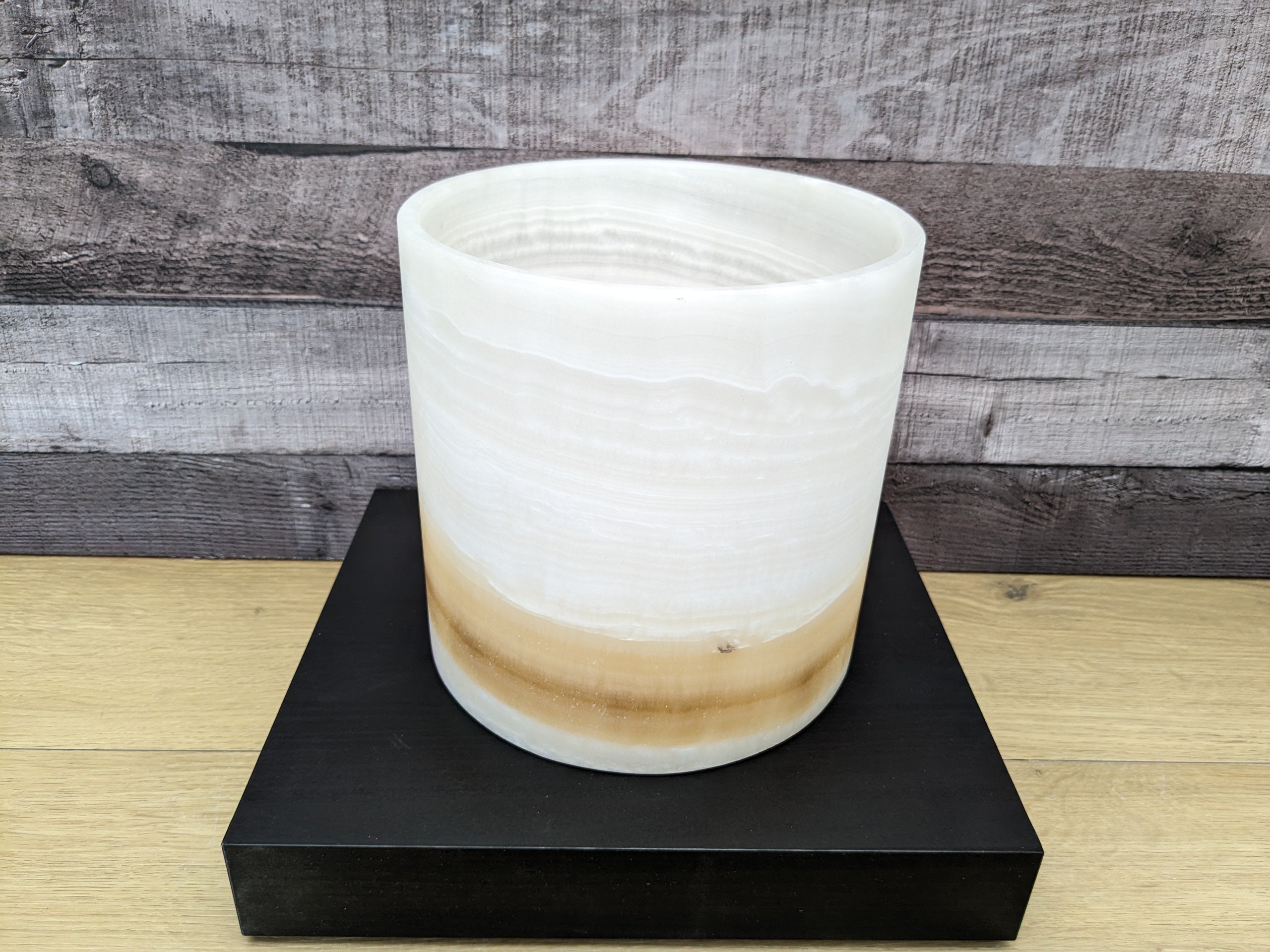 White Onyx Stone Trash Receptacle with Brown Stripe near Bottom. Handmade in Mexico. Ships from the USA. Buy now at www.felipeandgrace.com.