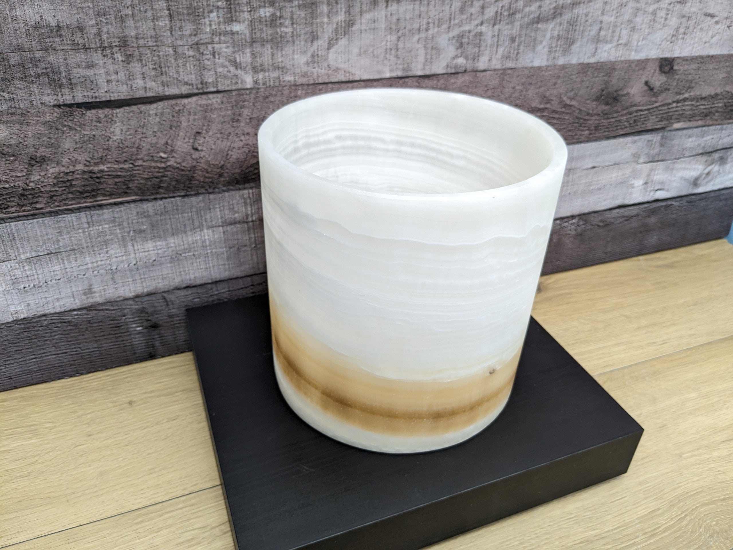 White Onyx Stone Trash Receptacle with Brown Stripe near Bottom. Handmade in Mexico. Ships from the USA. Buy now at www.felipeandgrace.com.