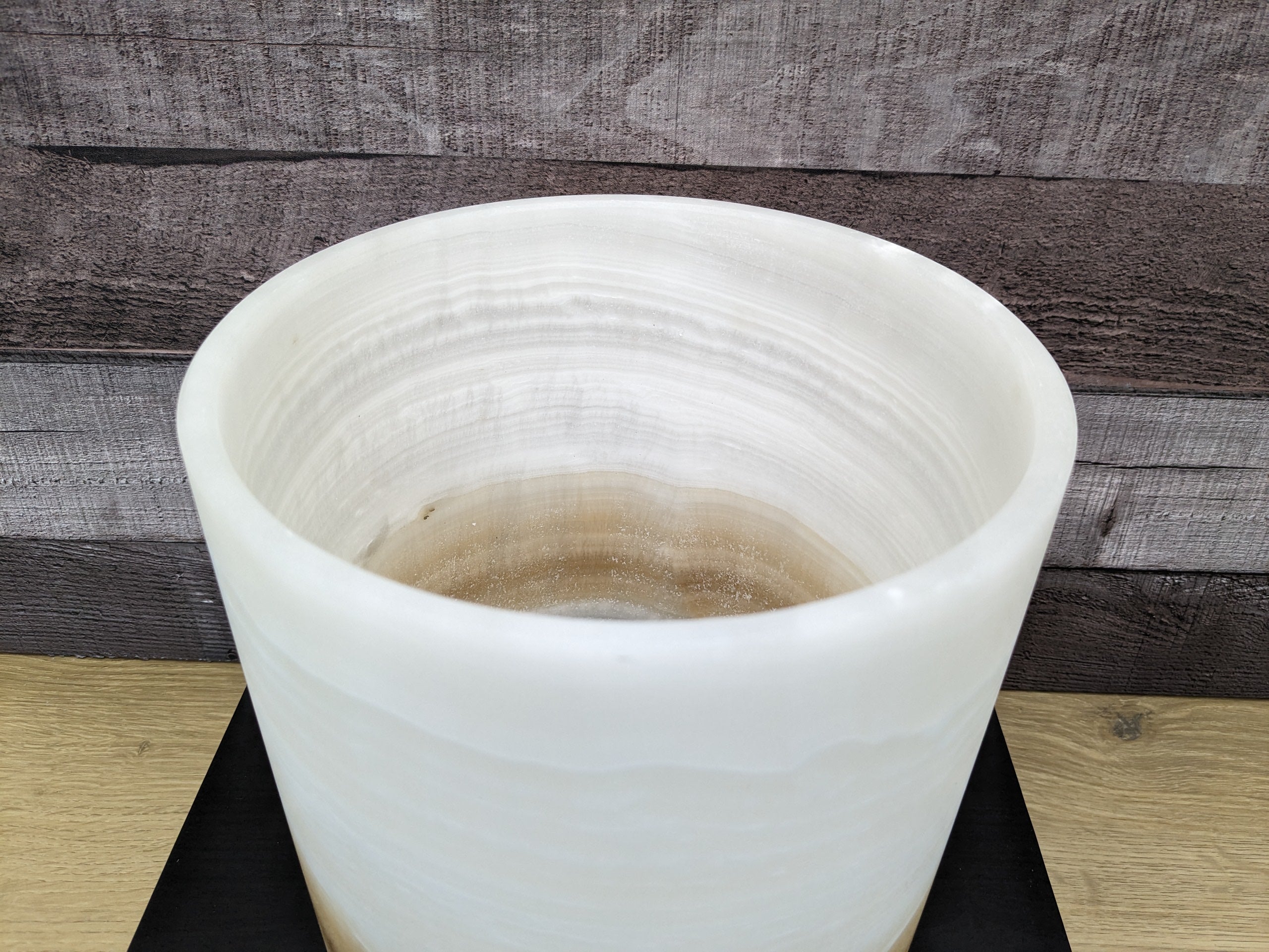 White Onyx Stone Trash Receptacle with Brown Stripe near Bottom. Handmade in Mexico. Ships from the USA. Buy now at www.felipeandgrace.com.