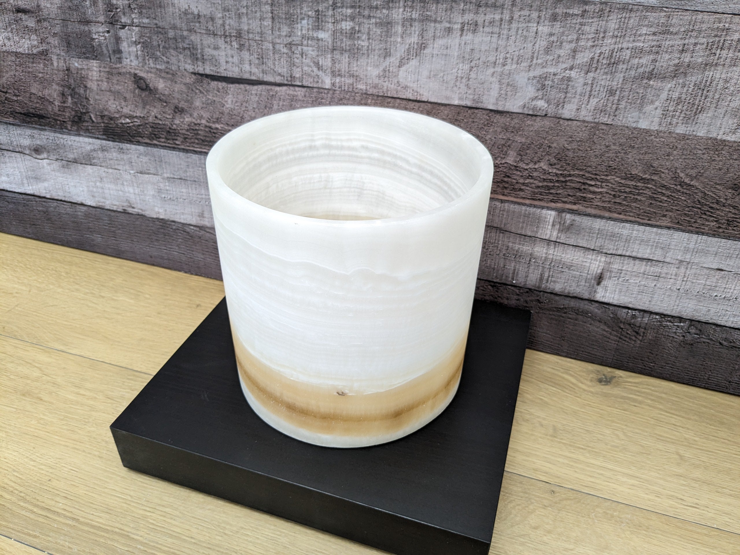 White Onyx Stone Trash Receptacle with Brown Stripe near Bottom. Handmade in Mexico. Ships from the USA. Buy now at www.felipeandgrace.com.