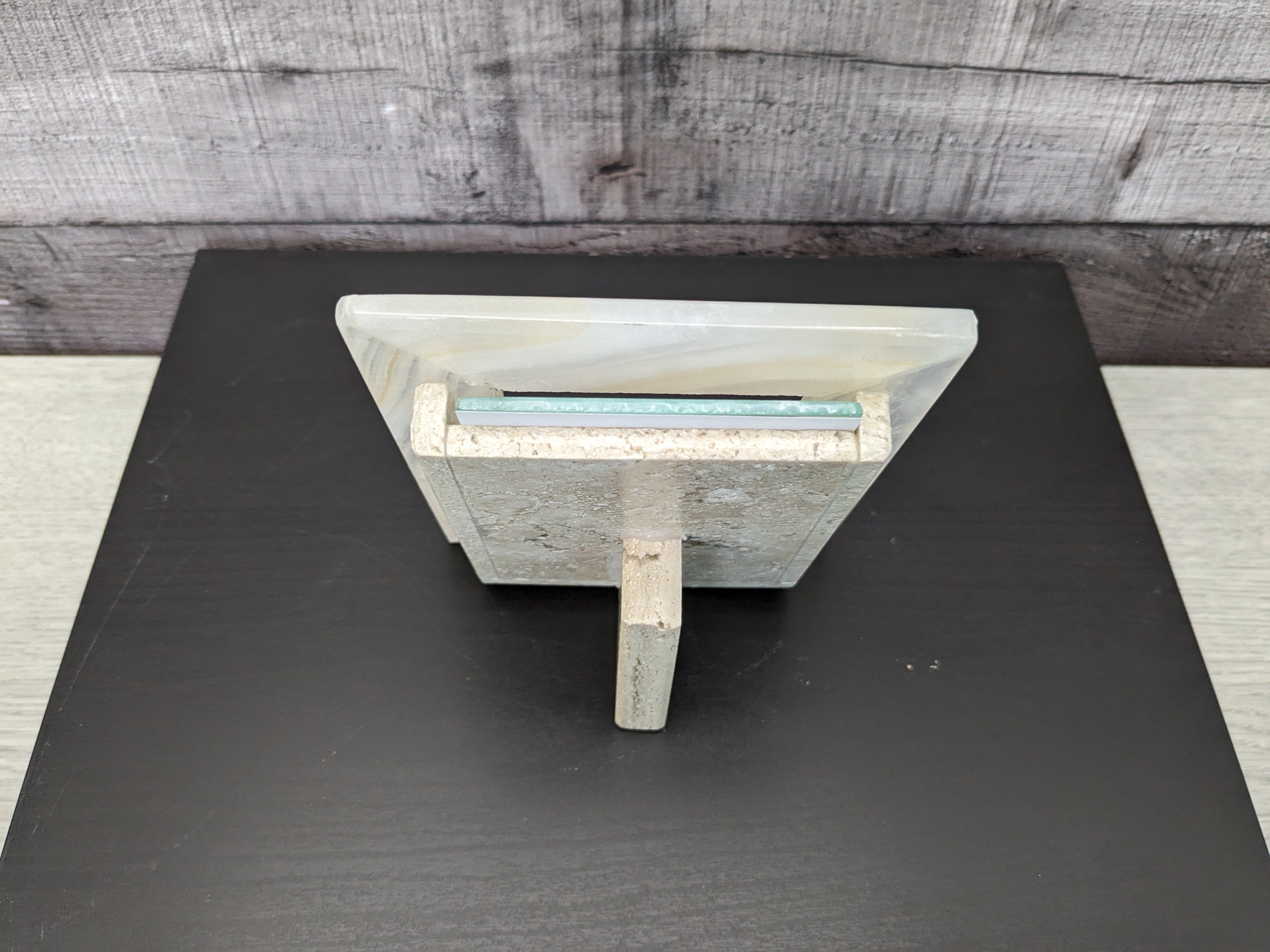 White Onyx Frame with Glass Covering and Travertine Stone Stand. Handmade in Mexico. We package and ship from the USA. Buy now at www.felipeandgrace.com.