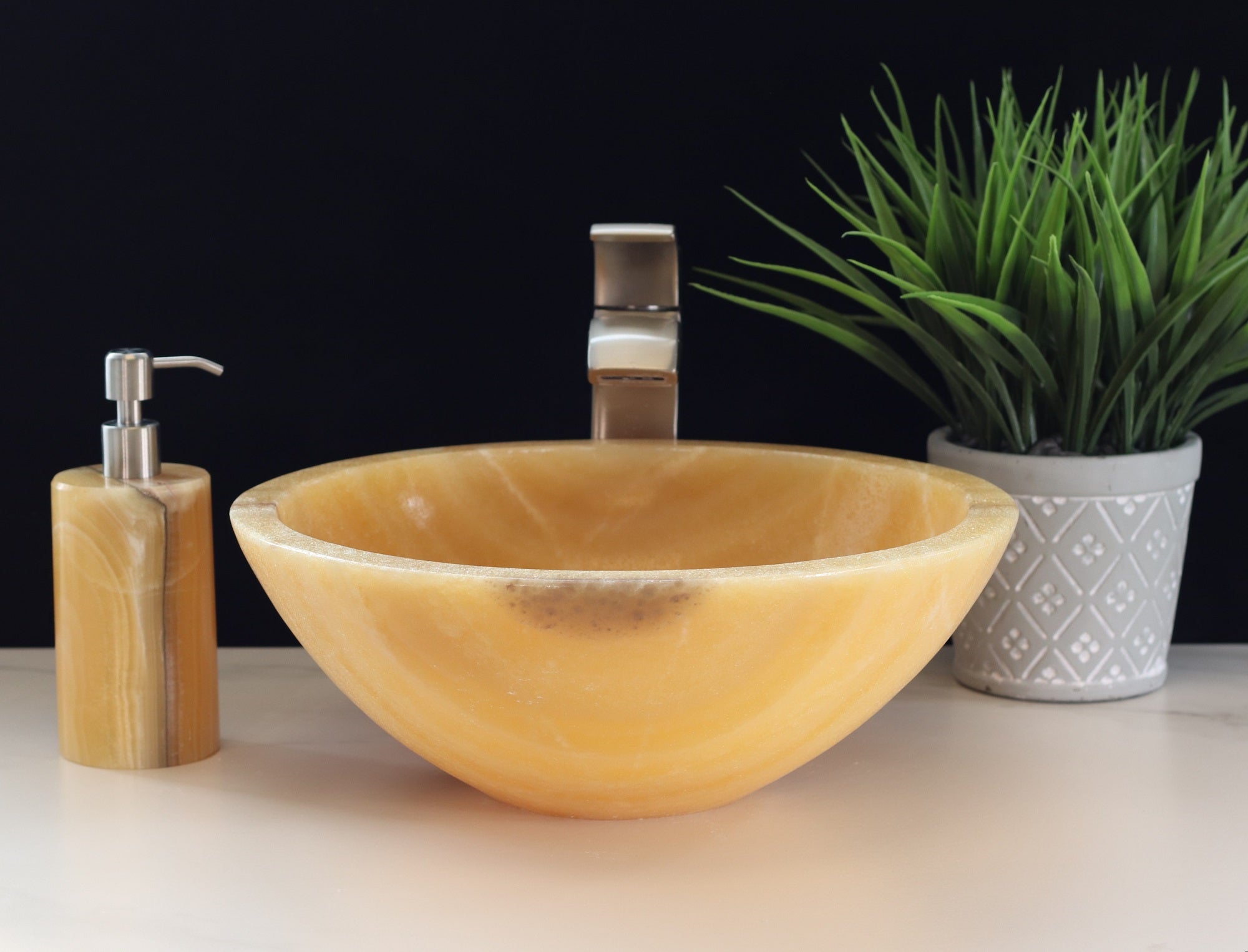 Beige and Orange Round Onyx Stone Bathroom Vessel Sink. A beautiful work of art. We offer fast shipping. Handmade in Mexico. We hand finish, package, and ship from the USA. Buy now at www.felipeandgrace.com.