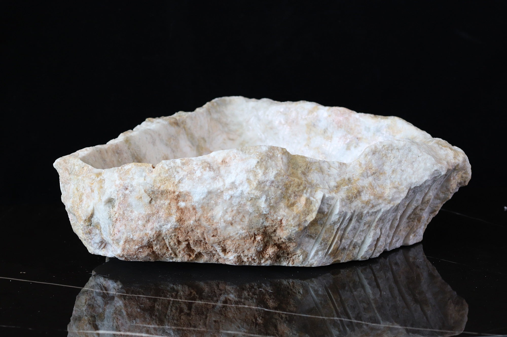 White and Cream Onyx Vessel Sink. A beautiful work of art. We offer fast shipping. Handmade in Mexico. We hand finish, package, and ship from the USA. Buy now at www.felipeandgrace.com.