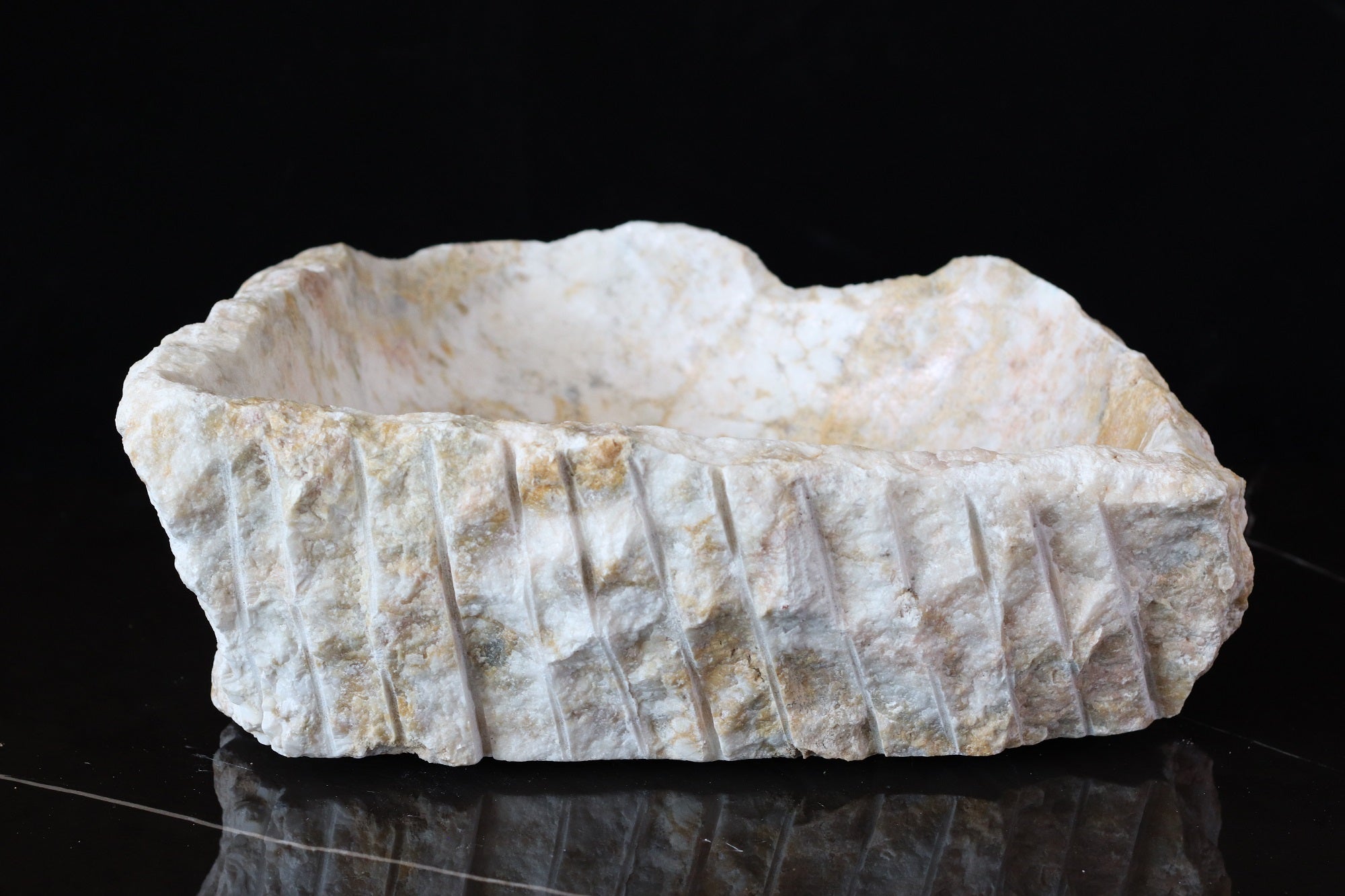 White and Cream Onyx Vessel Sink. A beautiful work of art. We offer fast shipping. Handmade in Mexico. We hand finish, package, and ship from the USA. Buy now at www.felipeandgrace.com.