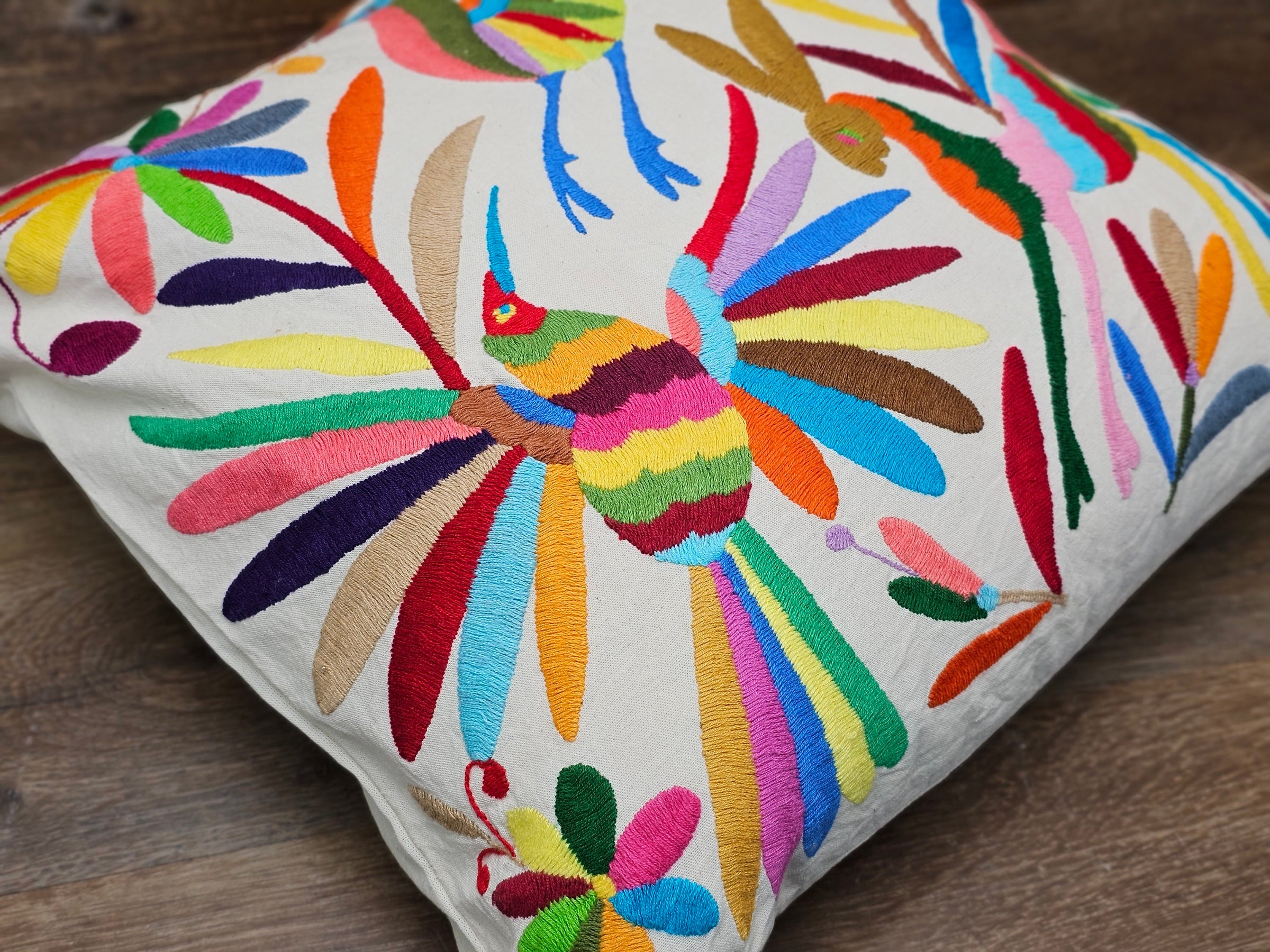 Otomi Tenango Pillow Cover Hand Embroidered with Birds, Flowers, and Animals in Vibrant Colors. Handmade in Mexico. Ships from the USA. Buy now at www.felipeandgrace.com. 