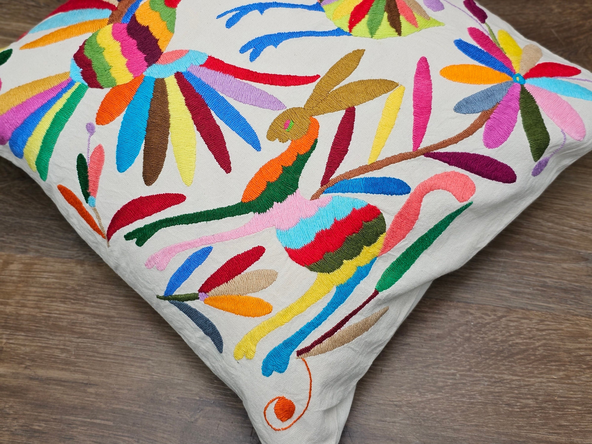 Otomi Tenango Pillow Cover Hand Embroidered with Birds, Flowers, and Animals in Vibrant Colors. Handmade in Mexico. Ships from the USA. Buy now at www.felipeandgrace.com. 