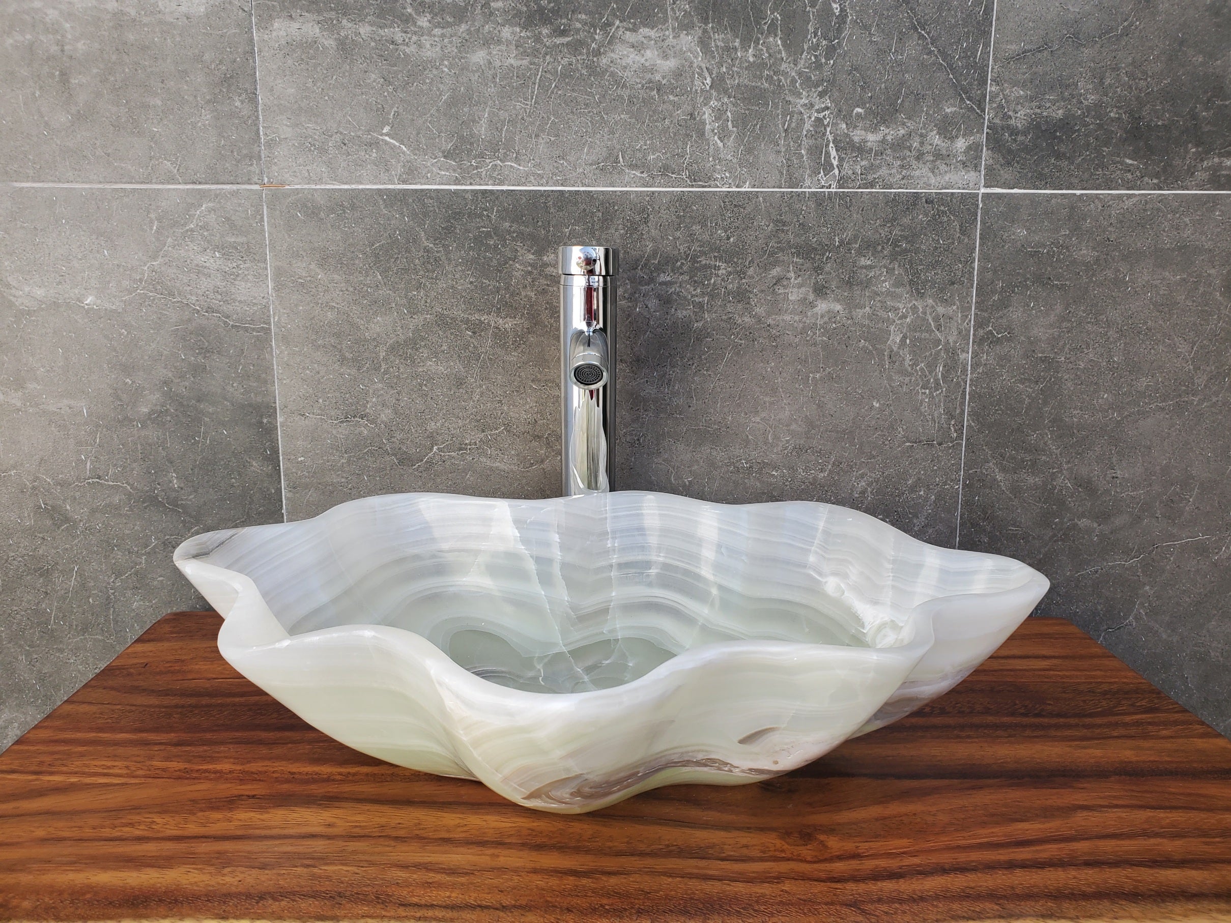 White Onyx Stone Bathroom Vessel Sink. Above counter sinks. High-polished Epoxy and Light Stone Sealant for the inner bowl are available. Hand finished. Made in Mexico. Hand Finished in USA. Buy Now at www.felipeandgrace.com