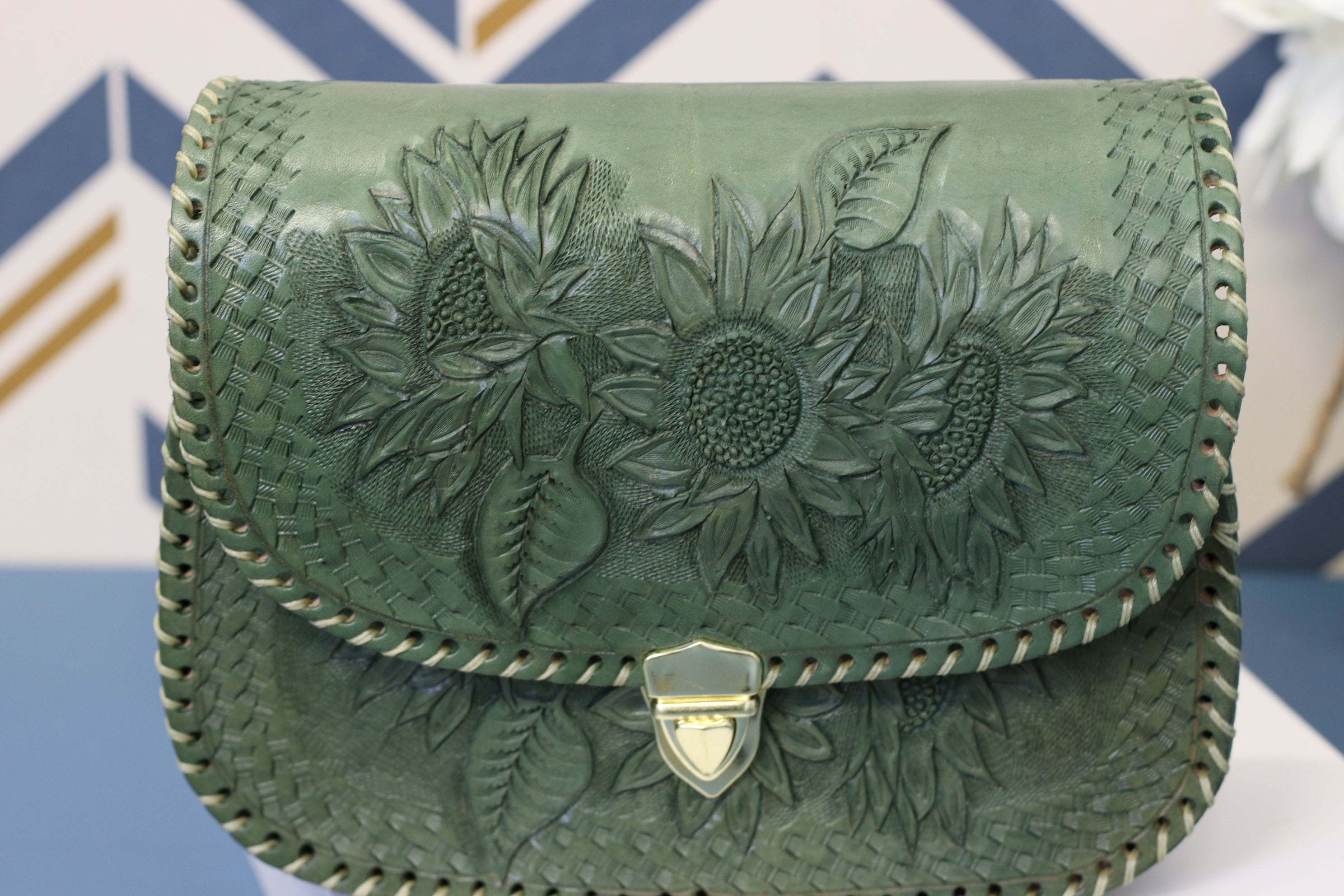Green Detachable Strap, Adjustable Strap, hand-tooled leather with gold clasp closure. Clutch Handbag. Made by artisans in Central Mexico, shipping from the USA. Handmade. Buy now at www.felipeandgrace.com.