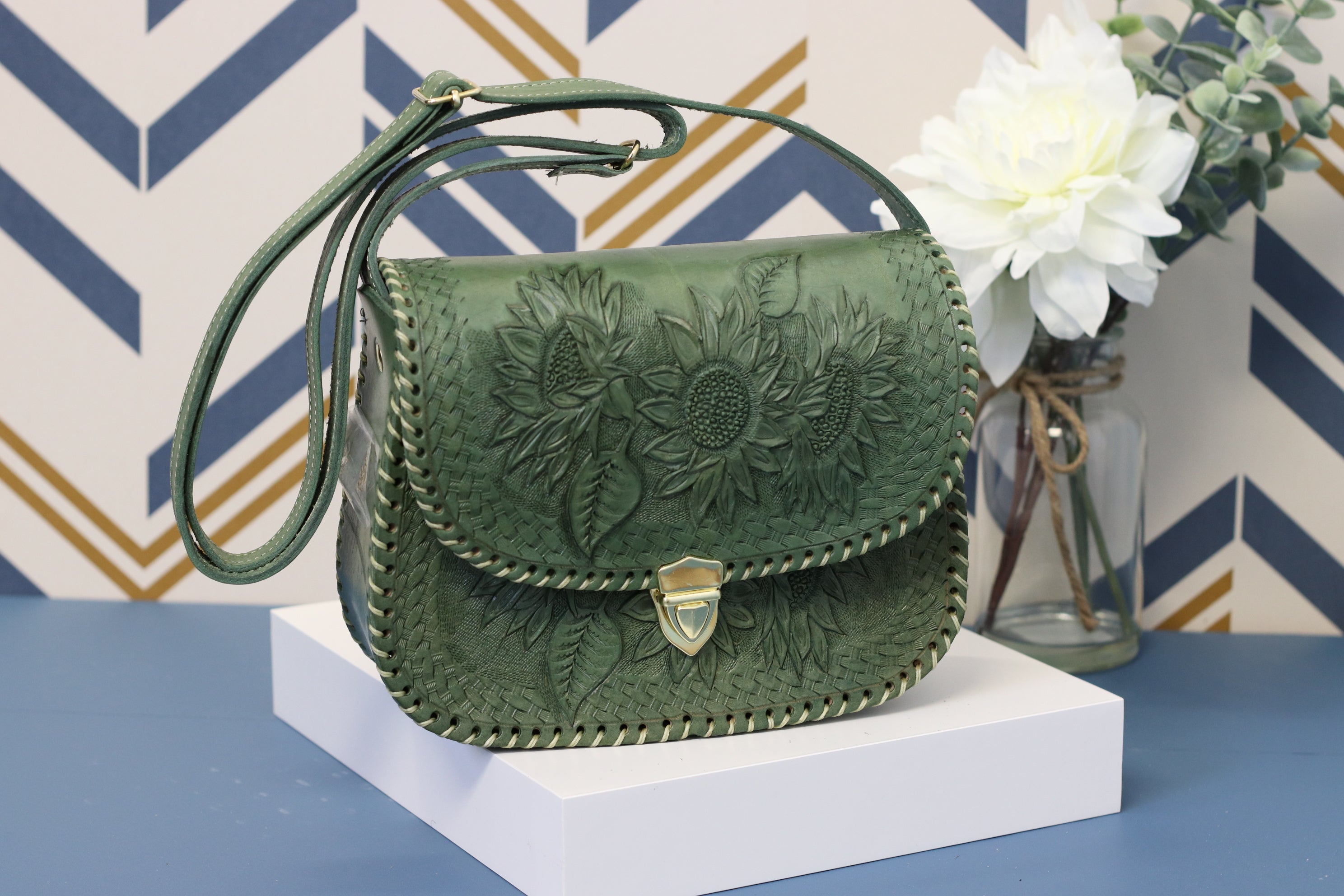 Green Detachable Strap, Adjustable Strap, hand-tooled leather with gold clasp closure. Clutch Handbag. Made by artisans in Central Mexico, shipping from the USA. Handmade. Buy now at www.felipeandgrace.com.